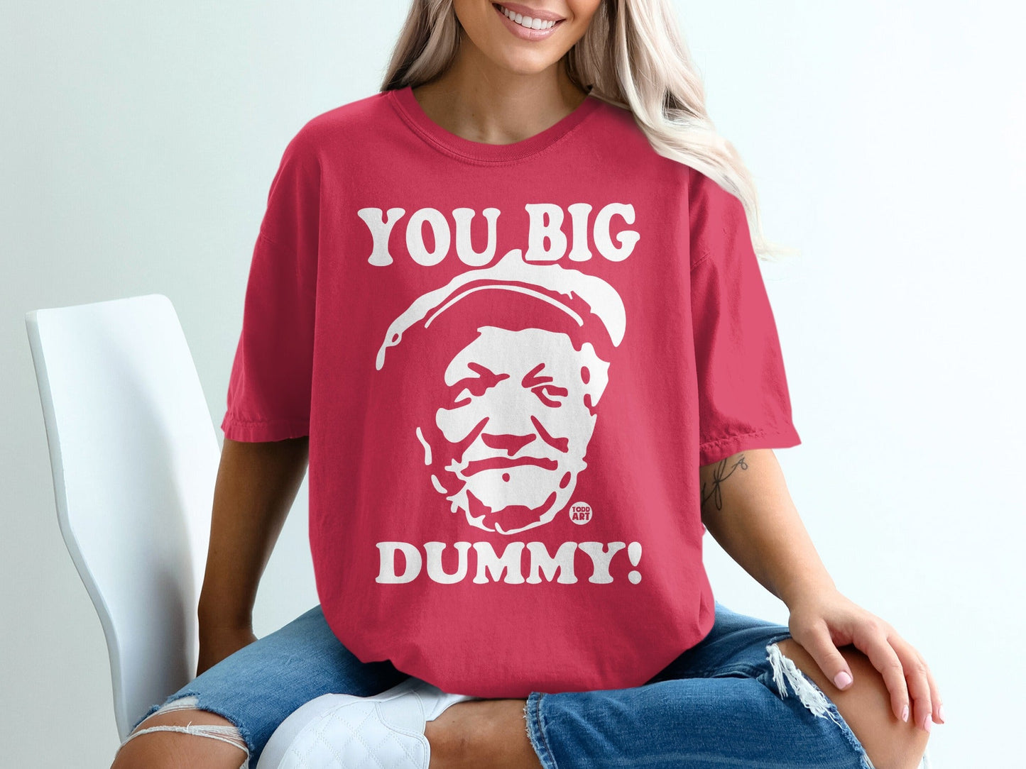 Red t-shirt with "YOU BIG DUMMY!" and a cartoon face.