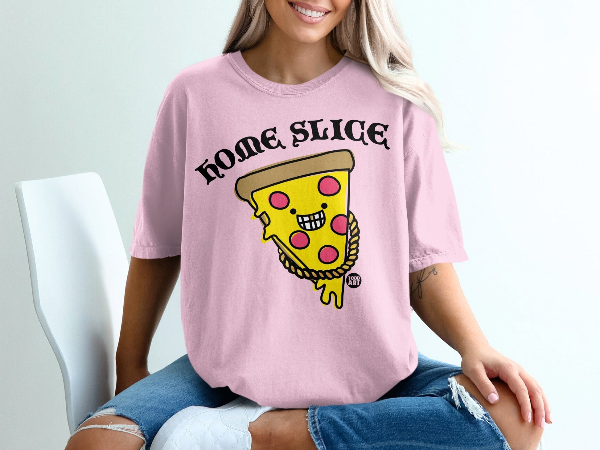Pink t-shirt with a cartoon pizza slice wearing a gold chain.