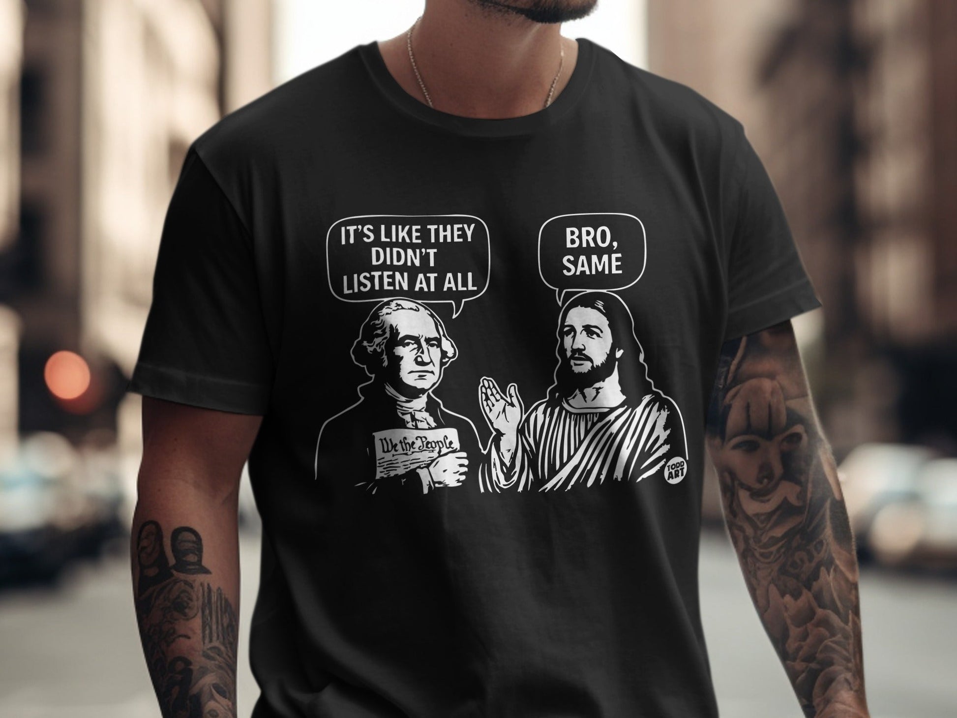 T-shirt with Washington and Jesus discussing "We the People" and not being heard.