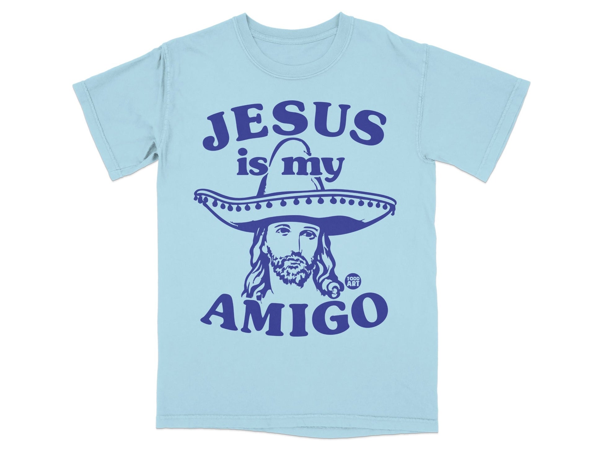 Light blue t-shirt with "Jesus is my amigo" and a sombrero-wearing Jesus.
