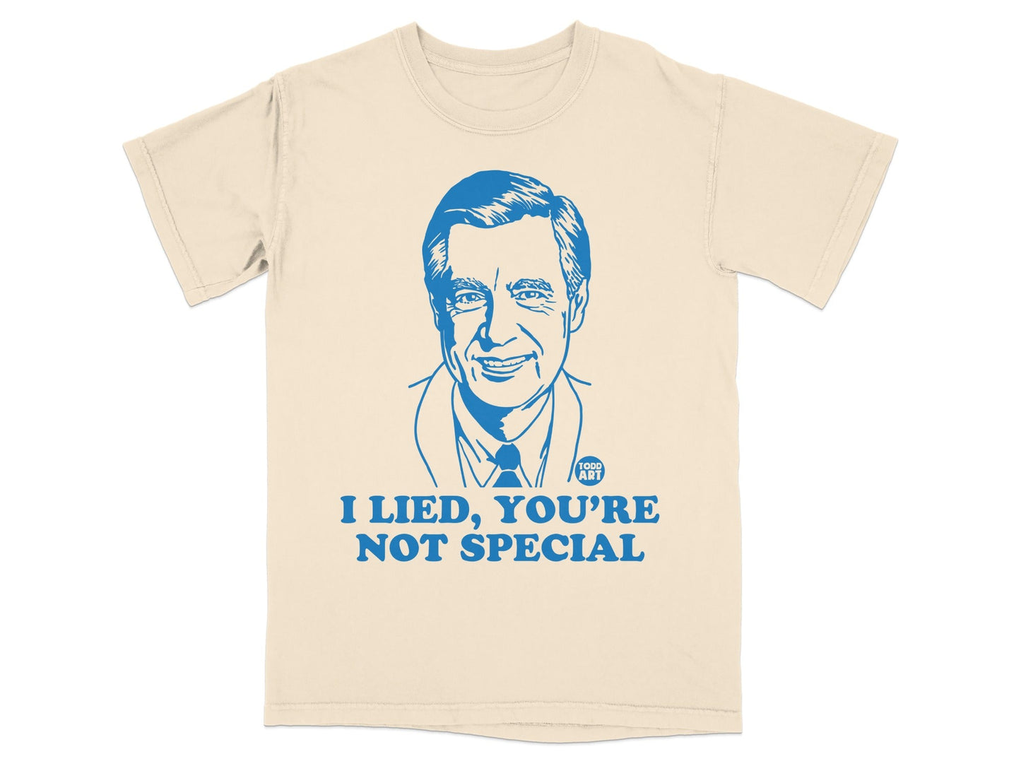 Cream t-shirt with Fred Rogers' portrait and "I LIED, YOU'RE NOT SPECIAL" text.