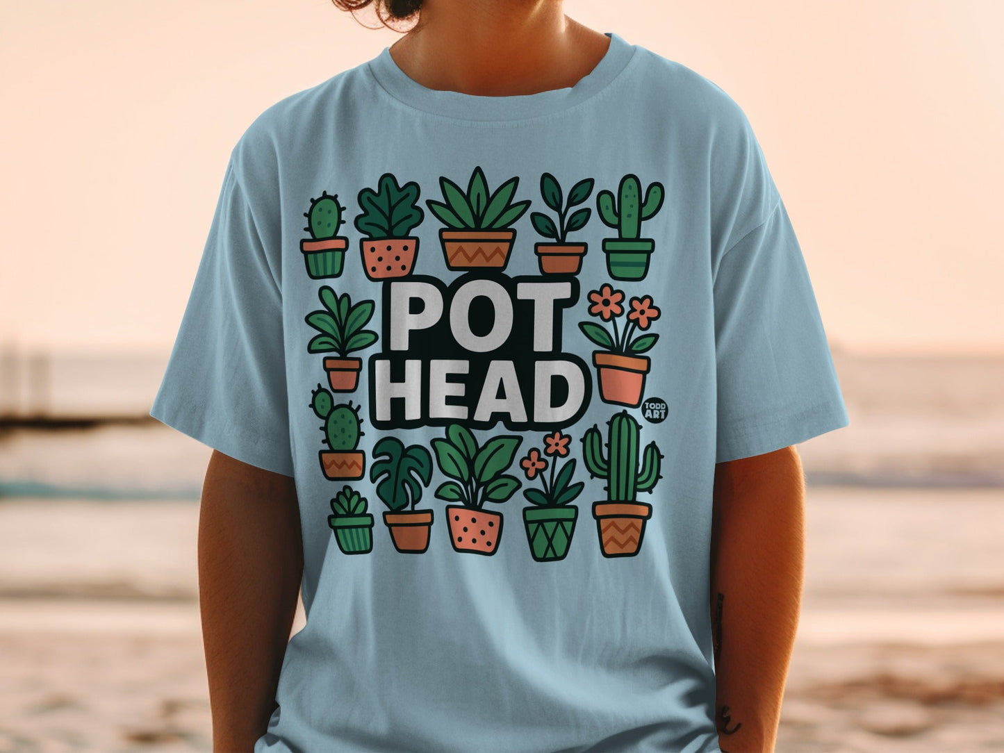 Light blue t-shirt with "POT HEAD" and potted plants design.