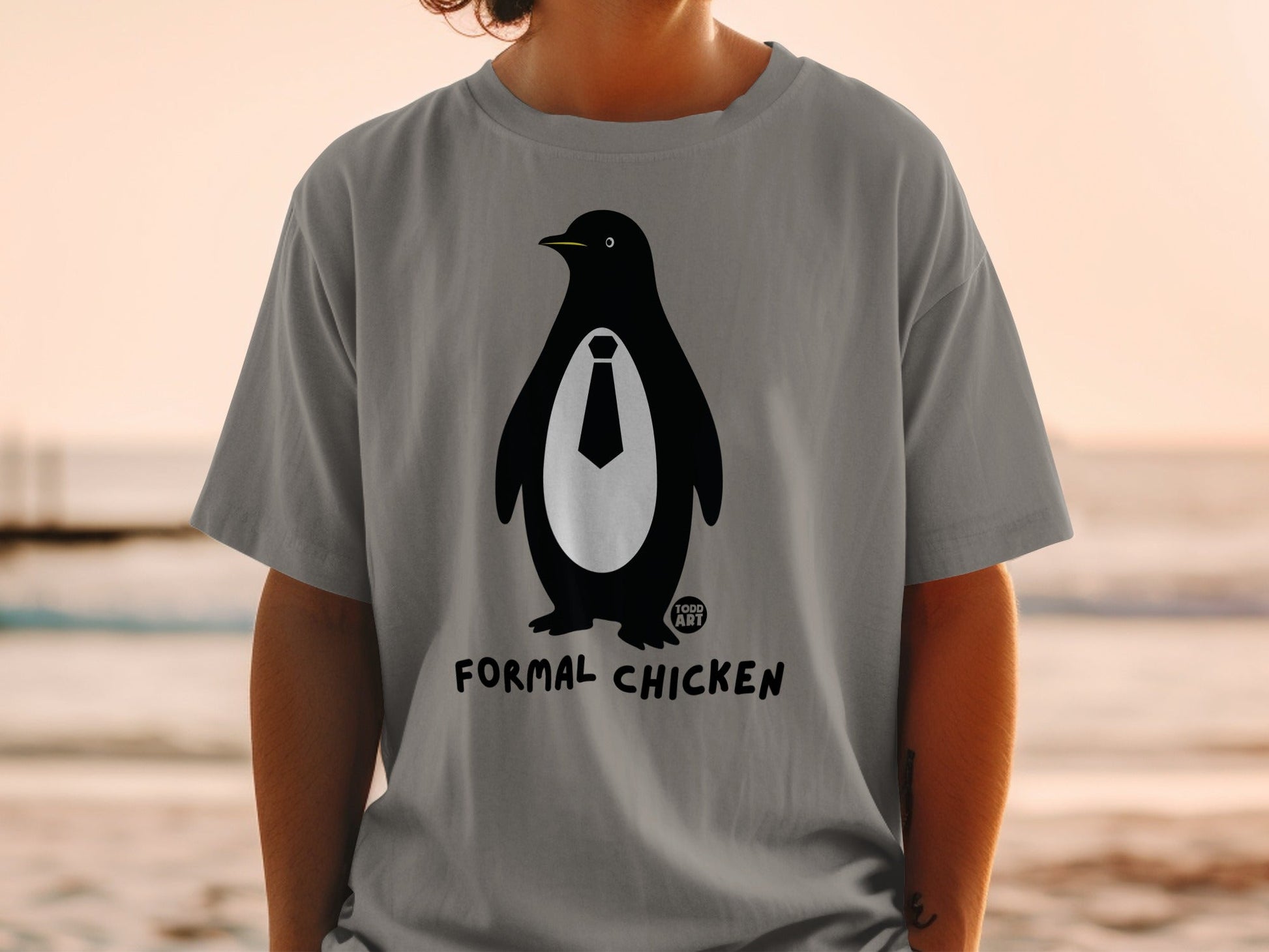 T-shirt with a penguin wearing a tie and the text "FORMAL CHICKEN".