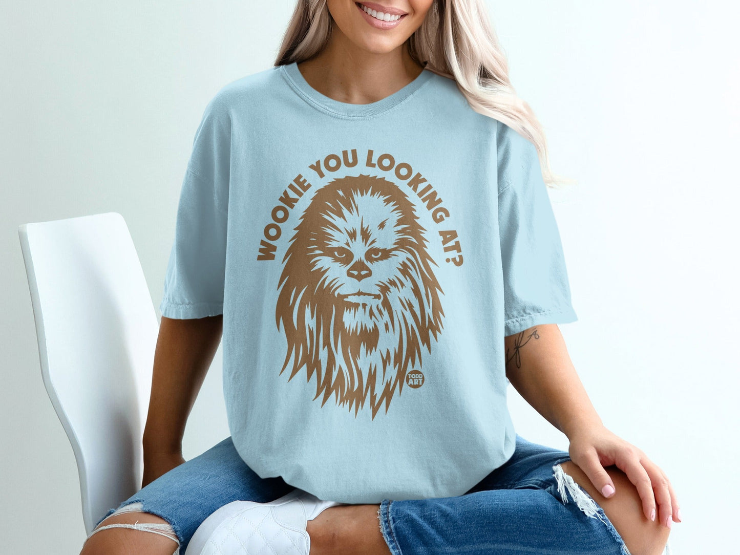 Light blue t-shirt with Wookiee graphic and "WOOKIE YOU LOOKING AT?" text.