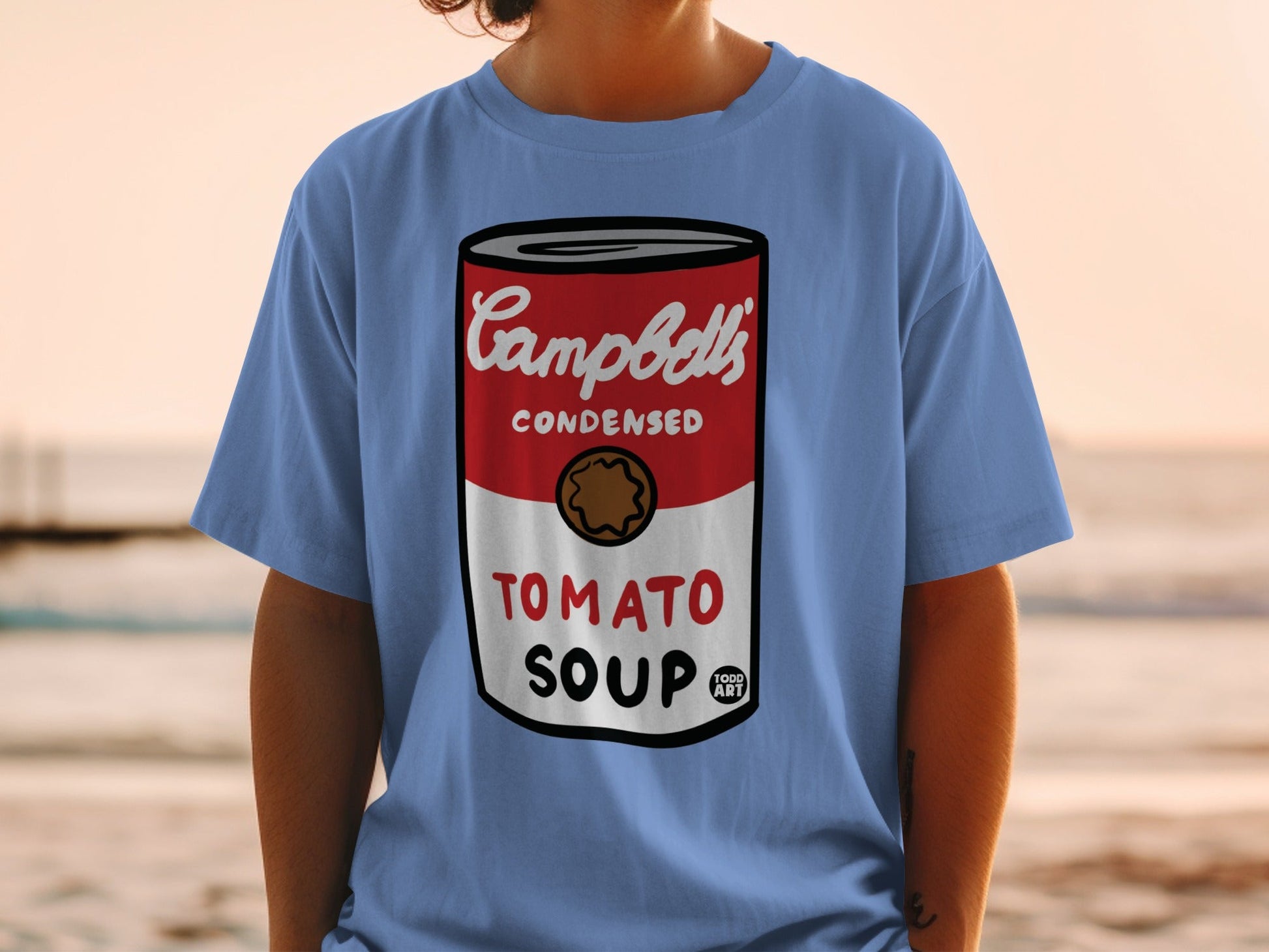 Blue t-shirt with Campbell's Condensed Tomato Soup can design.