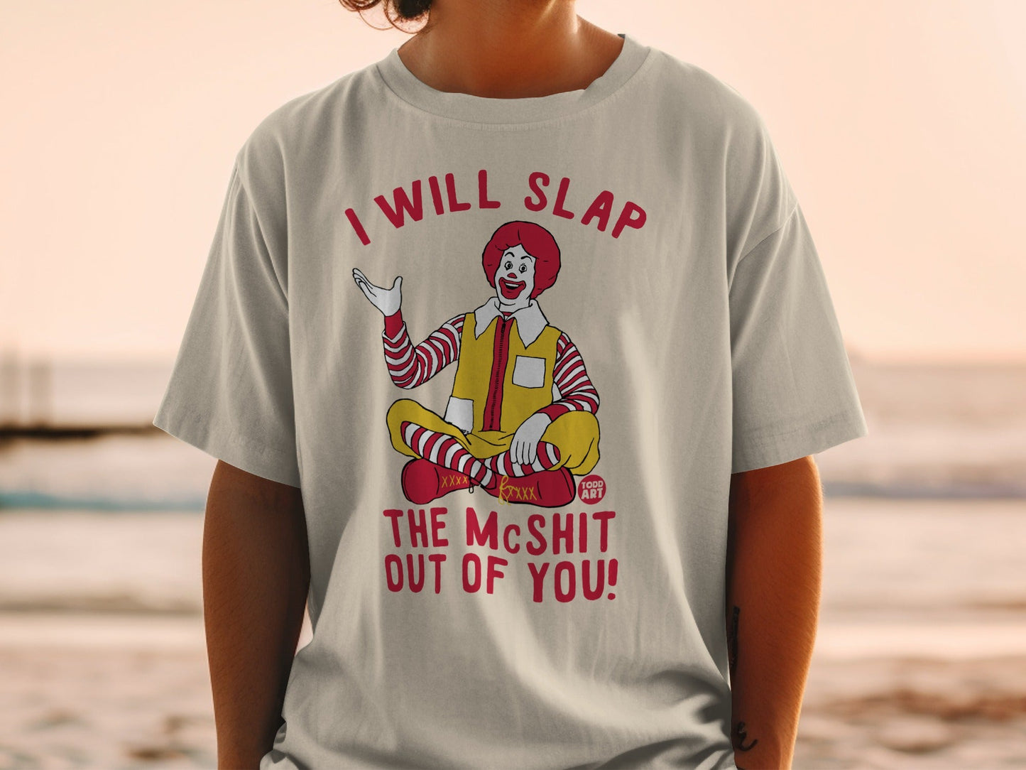 Ronald McDonald sitting cross-legged with text "I Will Slap The McShit Out of You!".