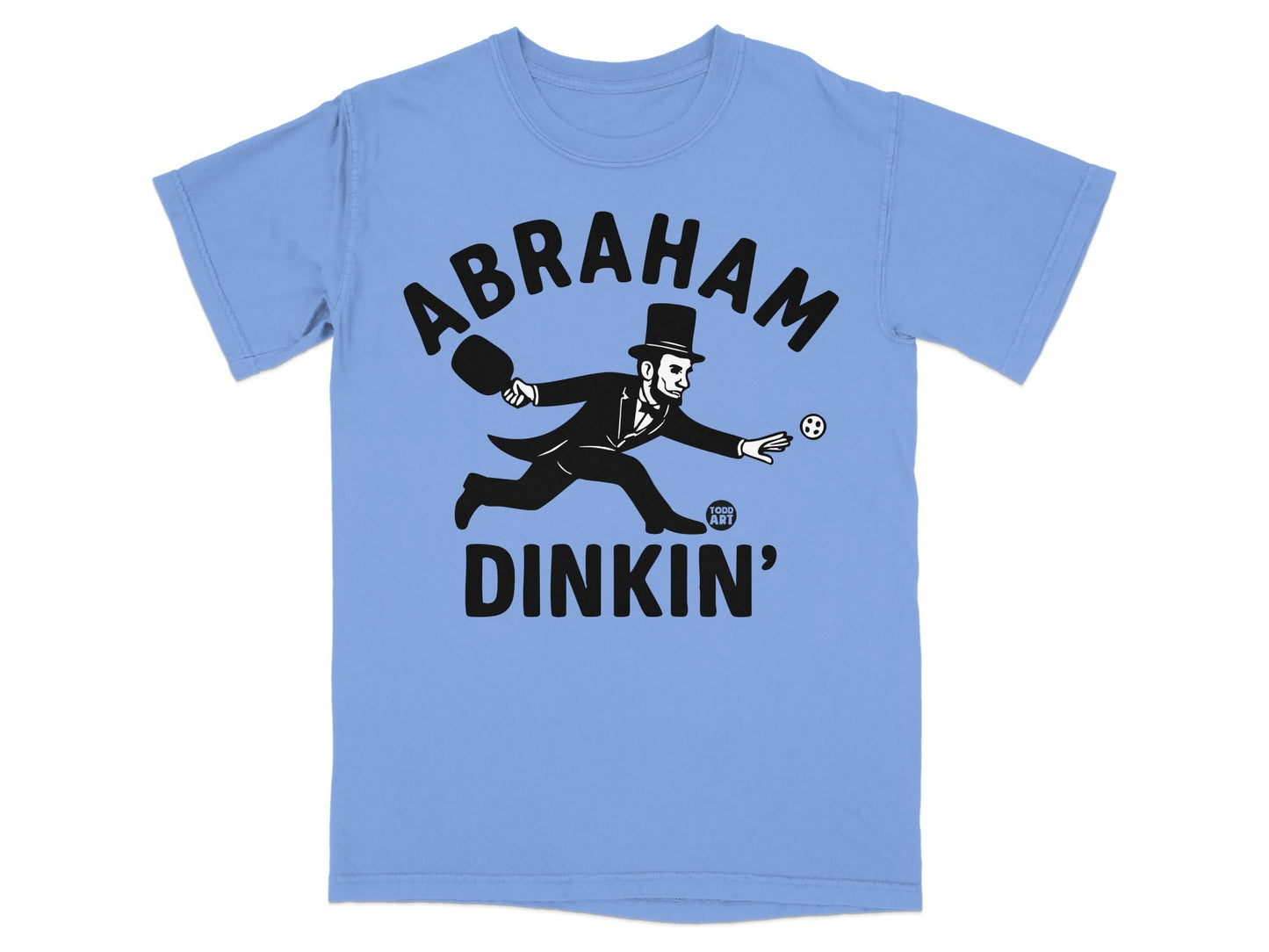 Abraham Lincoln in top hat playing paddleball on light blue t-shirt.
