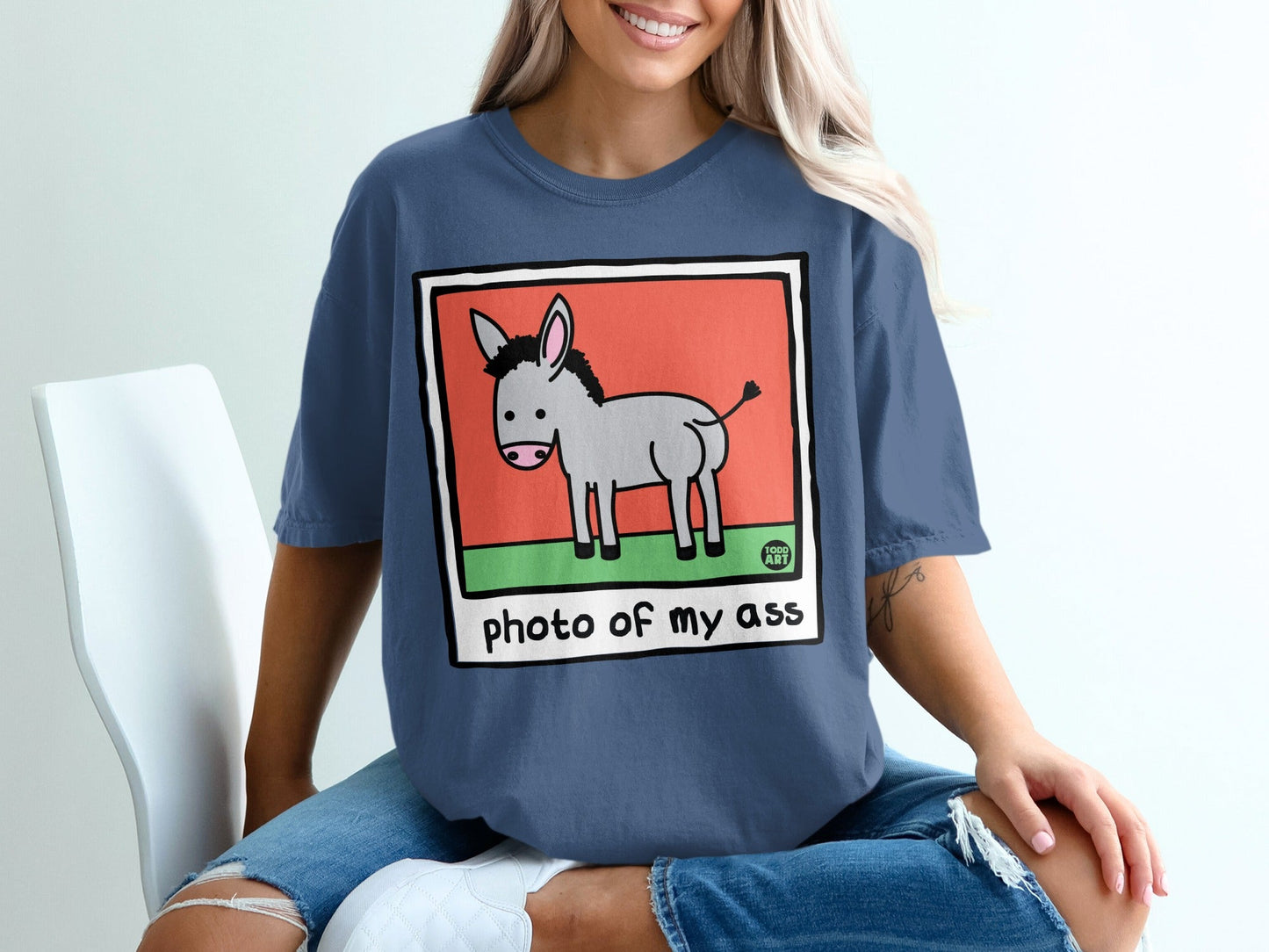 Donkey illustration on t-shirt, "photo of my ass" text.