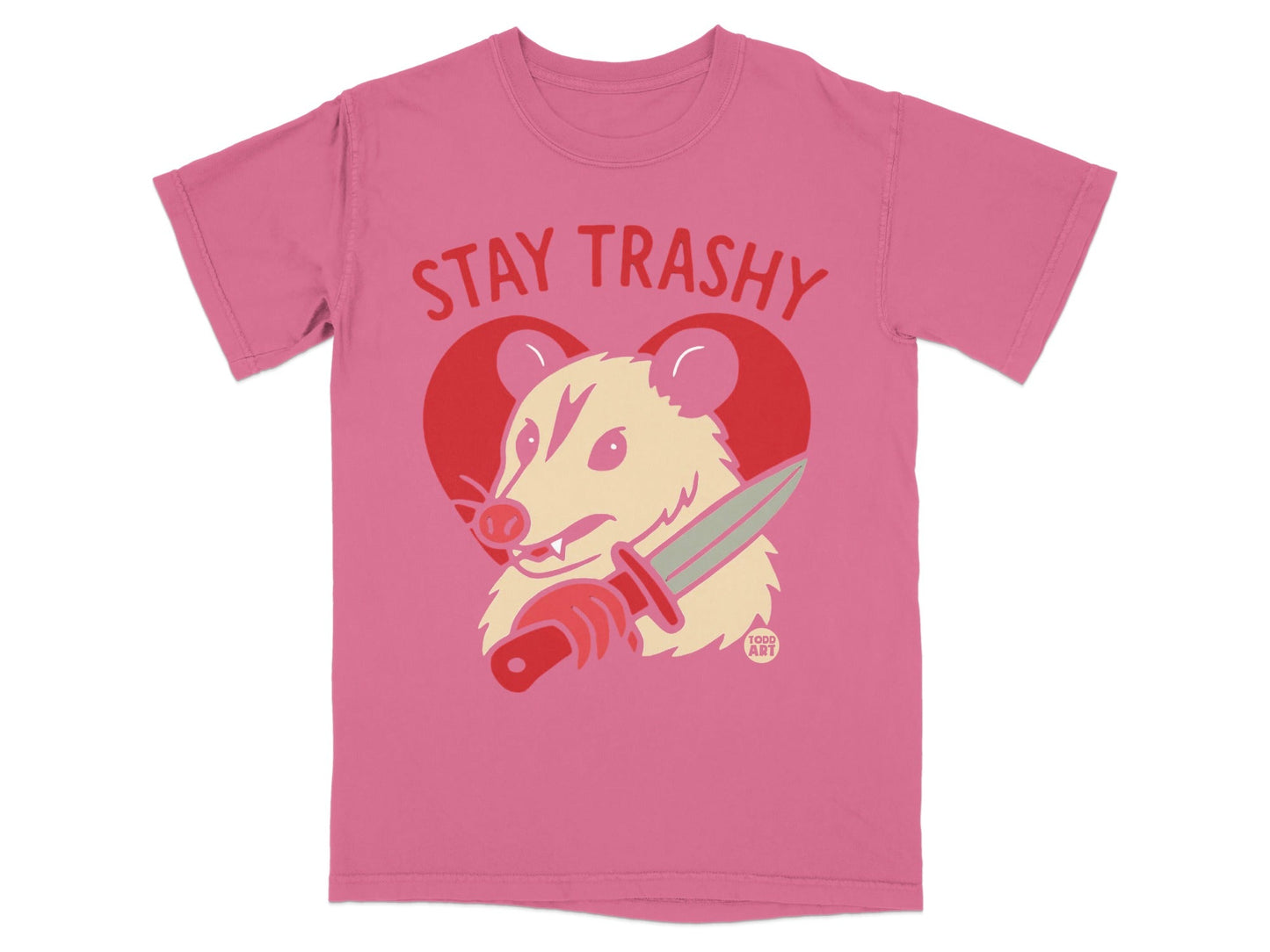 Pink t-shirt with "STAY TRASHY" and a possum holding a knife.