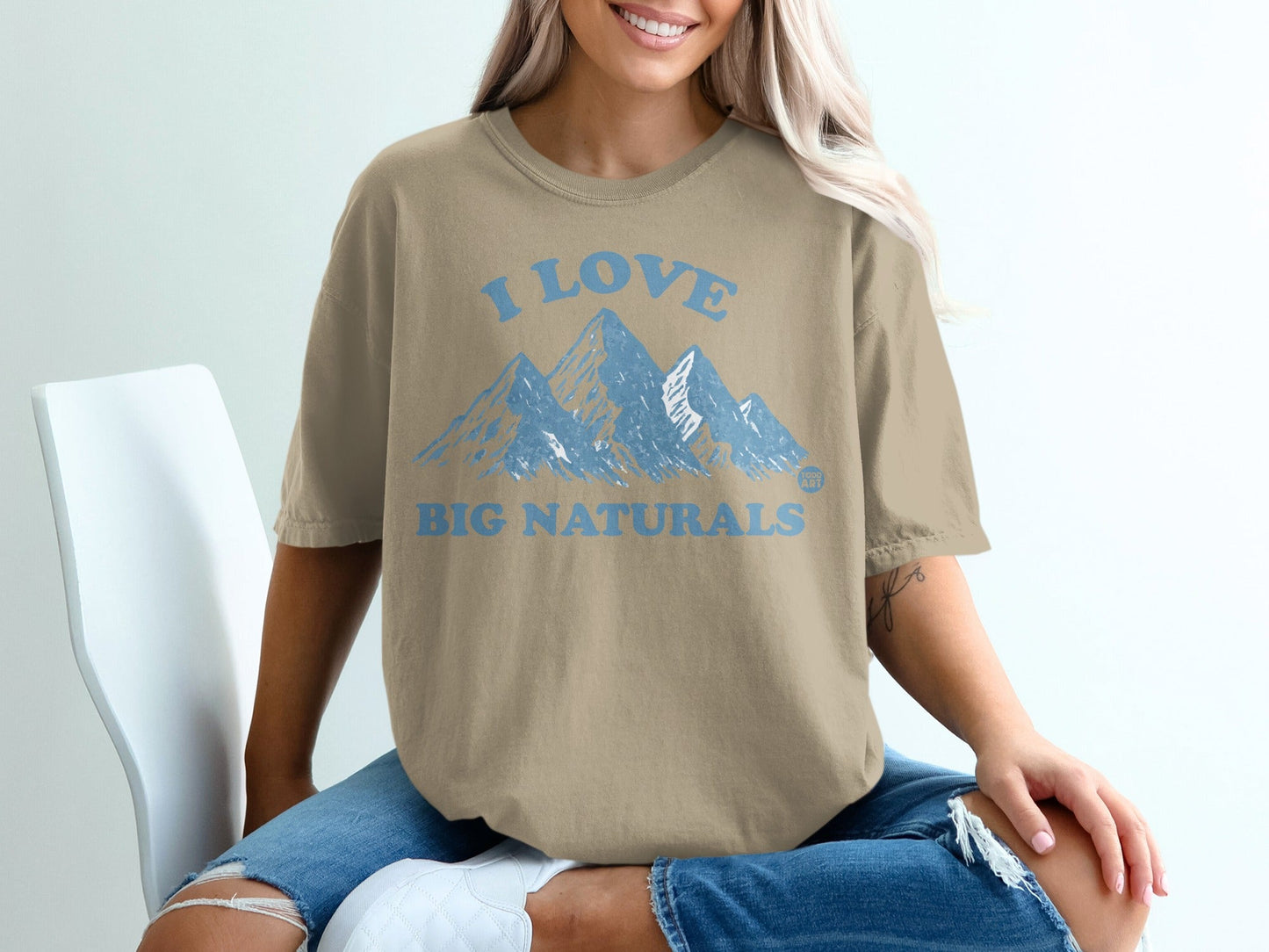 Tan t-shirt with "I LOVE BIG NATURALS" and mountain graphic.