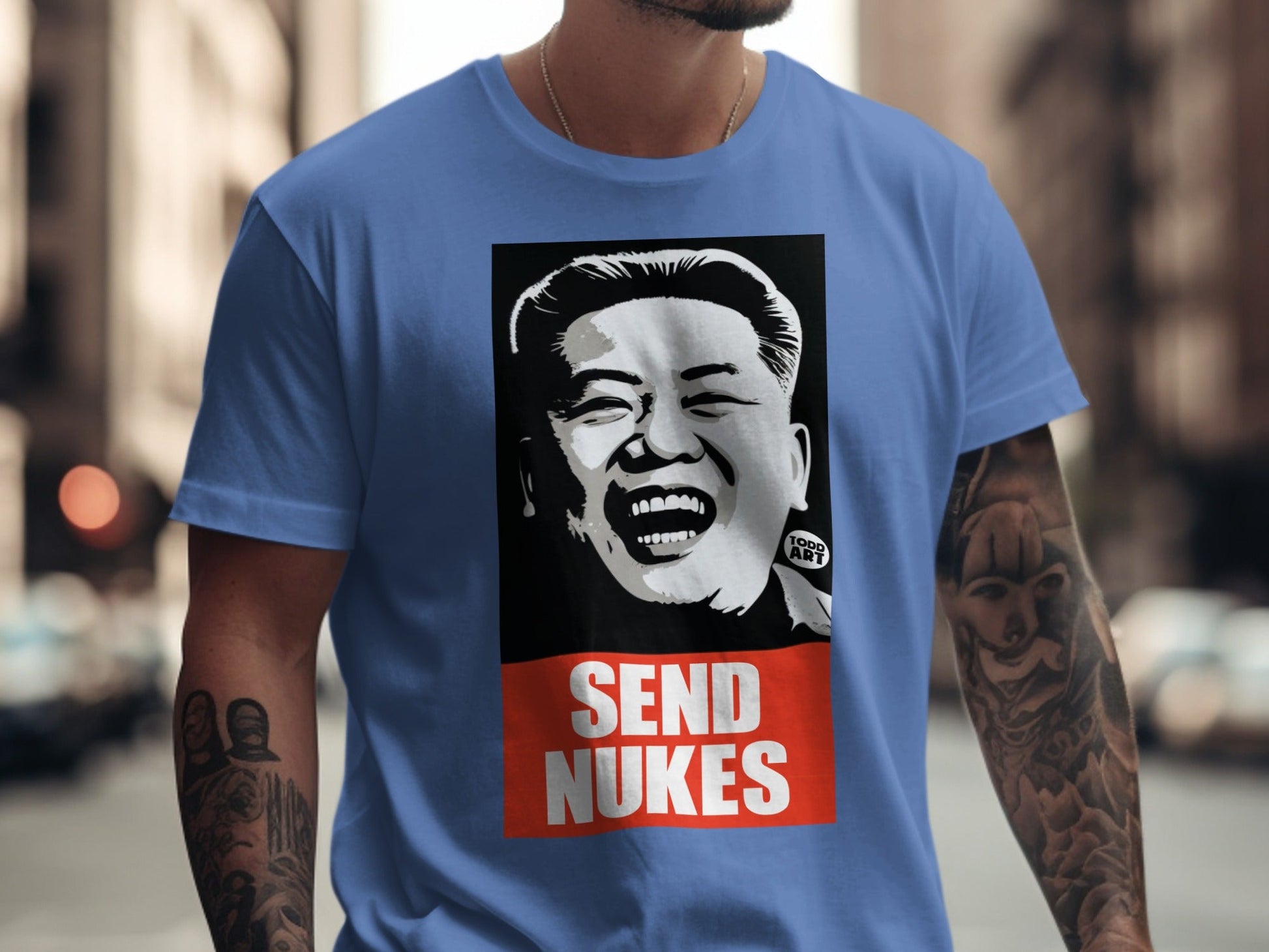 T-shirt with graphic of Kim Jong Un and text "SEND NUKES".