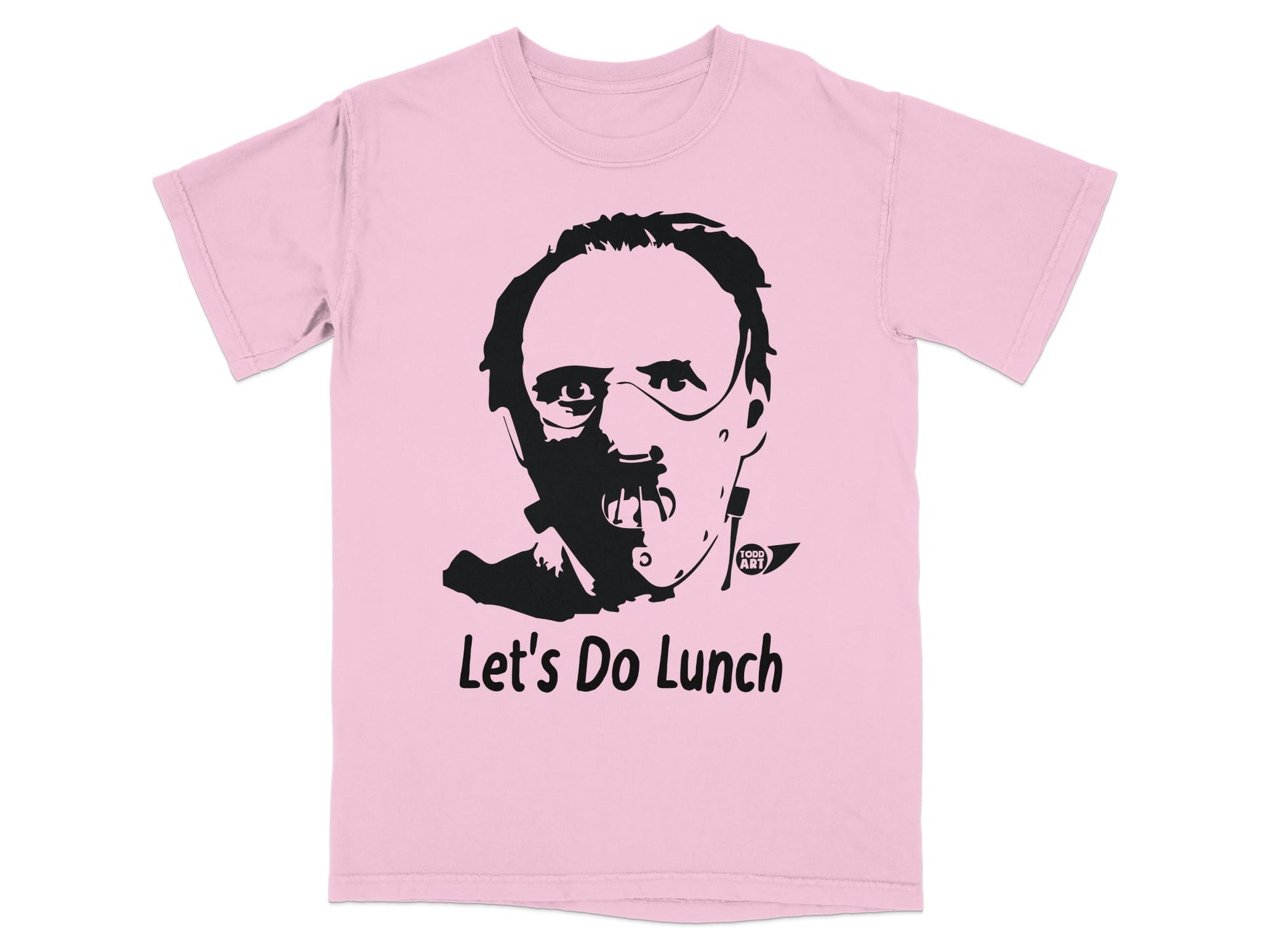 Pink t-shirt with a black graphic of Hannibal Lecter's face and "Let's Do Lunch" text.