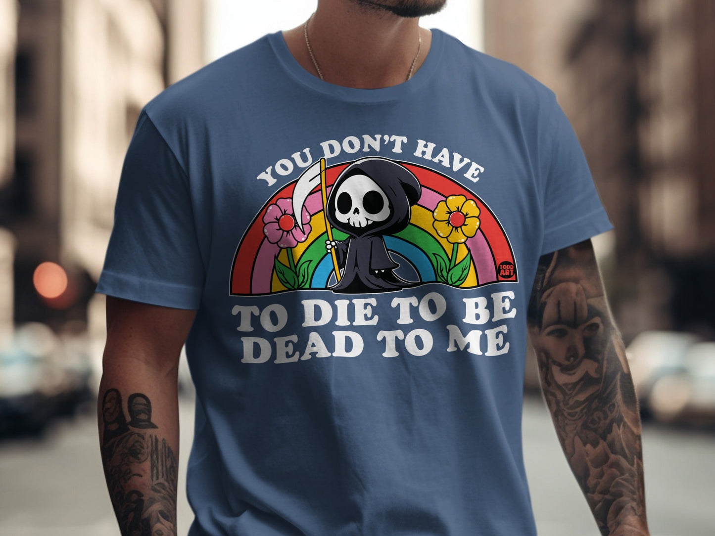 T-shirt with Grim Reaper, rainbow, flowers, and text "You don't have to die to be dead to me."