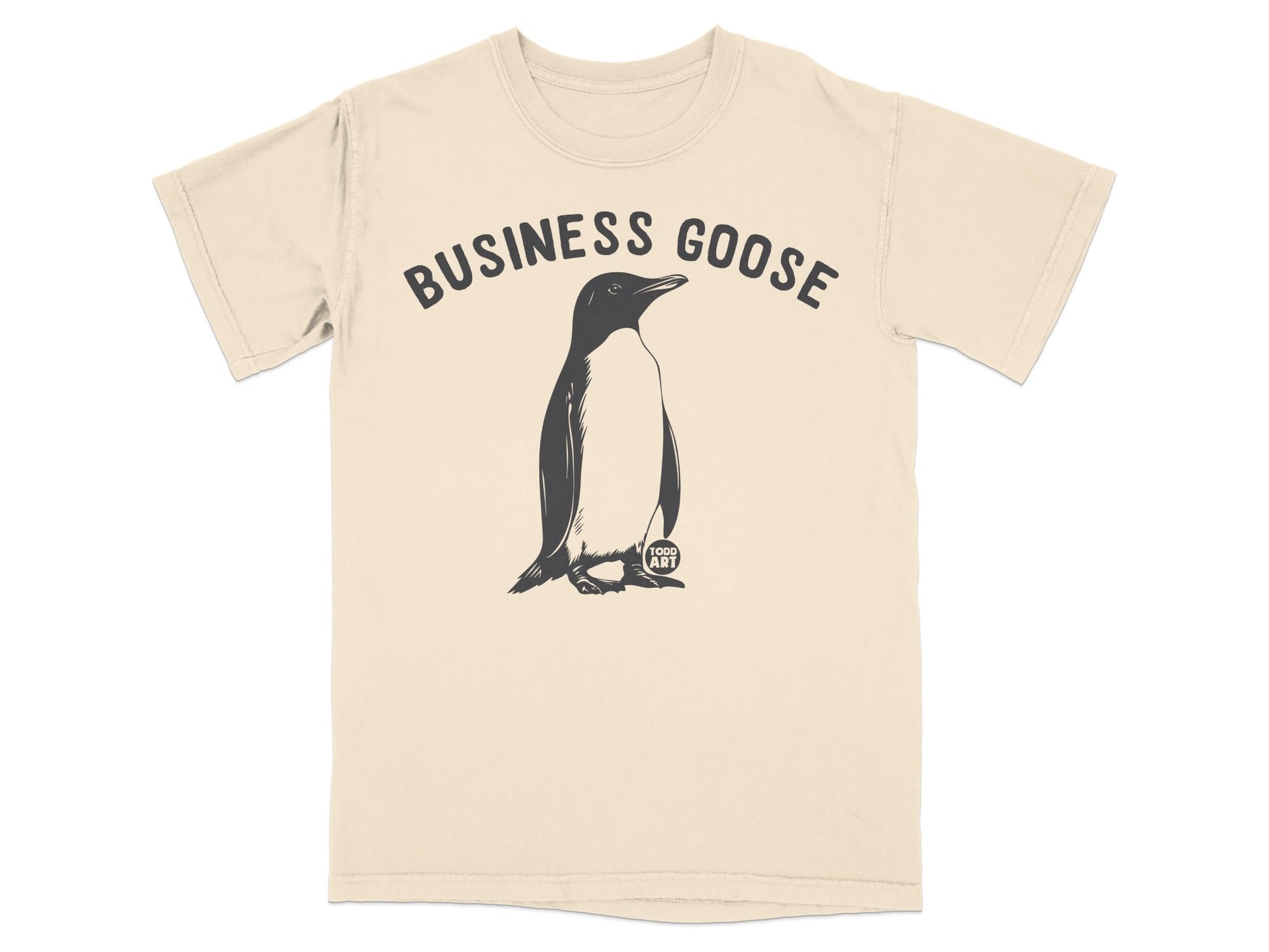 T-shirt with a penguin graphic and "BUSINESS GOOSE" text.