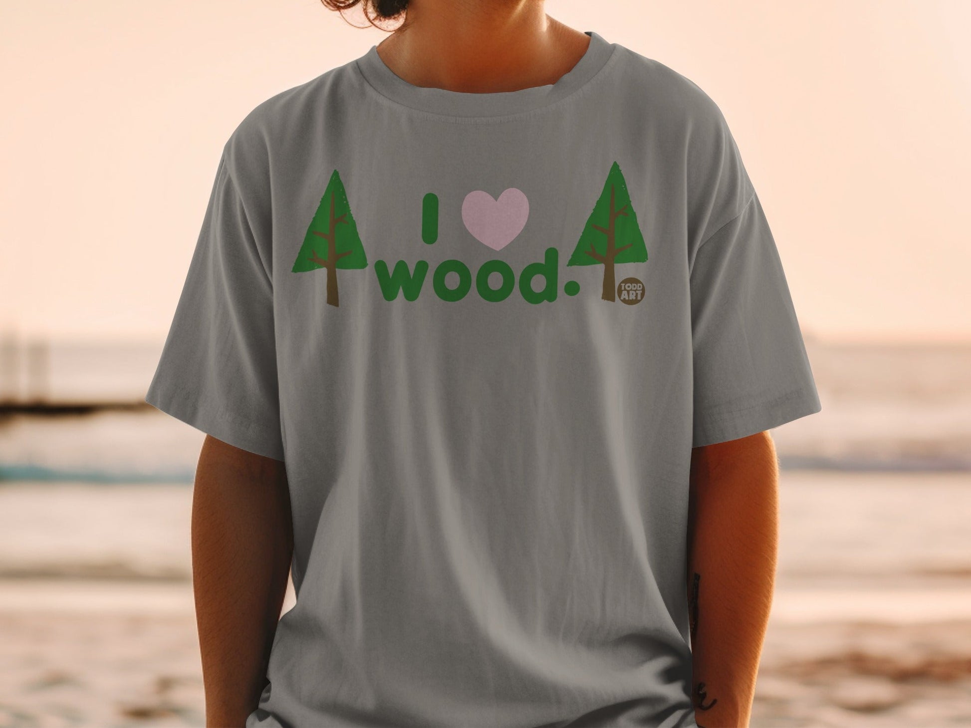 Gray t-shirt with "I ‚ù§Ô∏è wood." text and tree graphics.