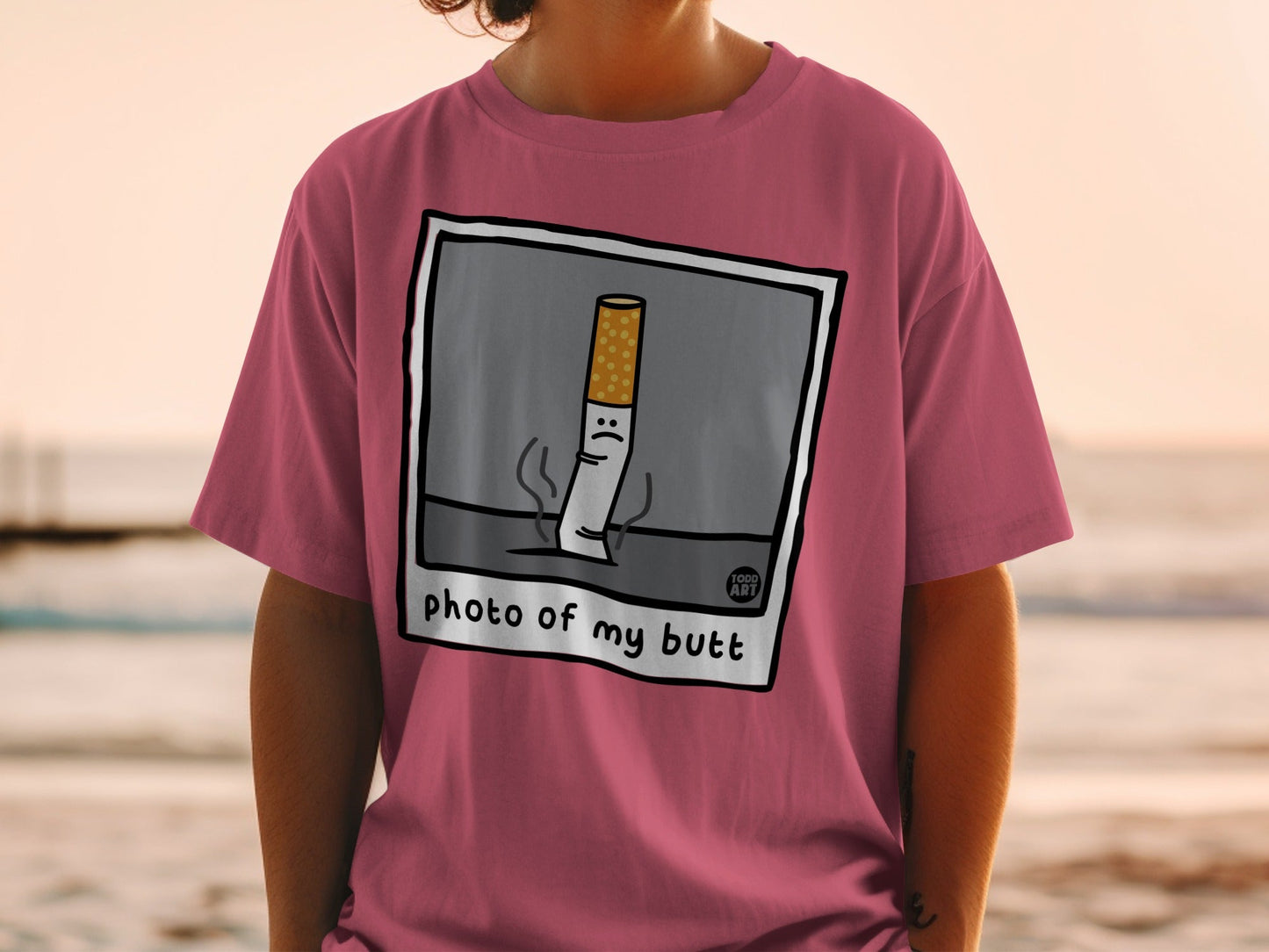 T-shirt with cigarette illustration and "photo of my butt" text.