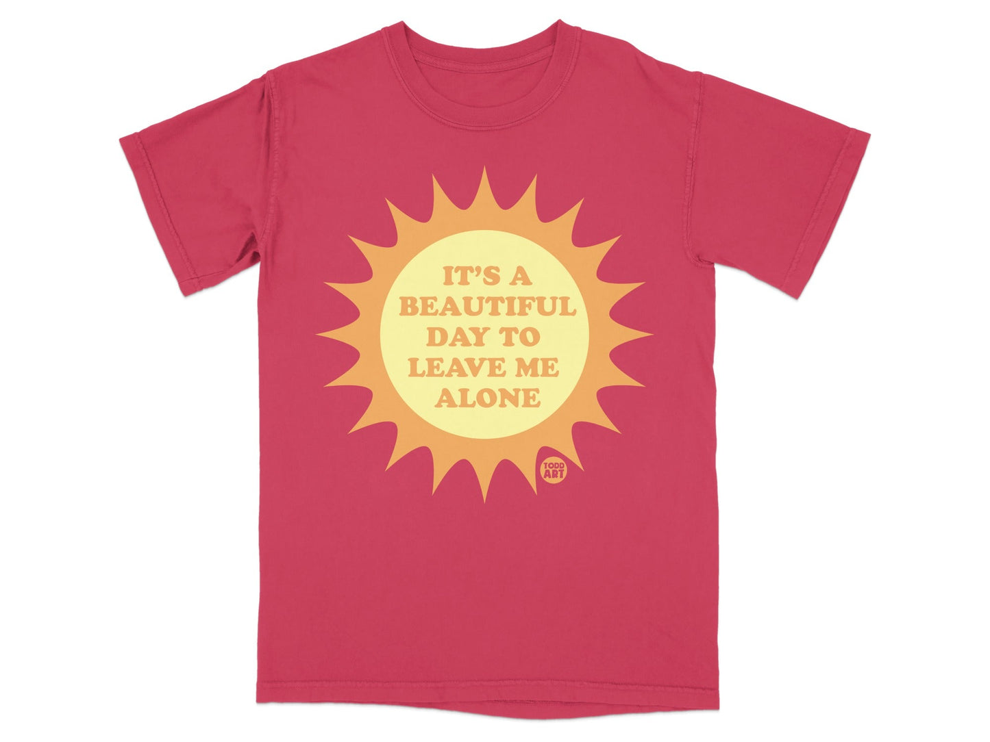 Red t-shirt with a sun graphic and text "IT'S A BEAUTIFUL DAY TO LEAVE ME ALONE".