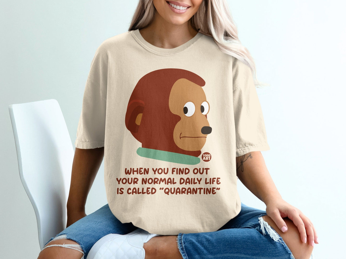 T-shirt with monkey graphic and text about quarantine.