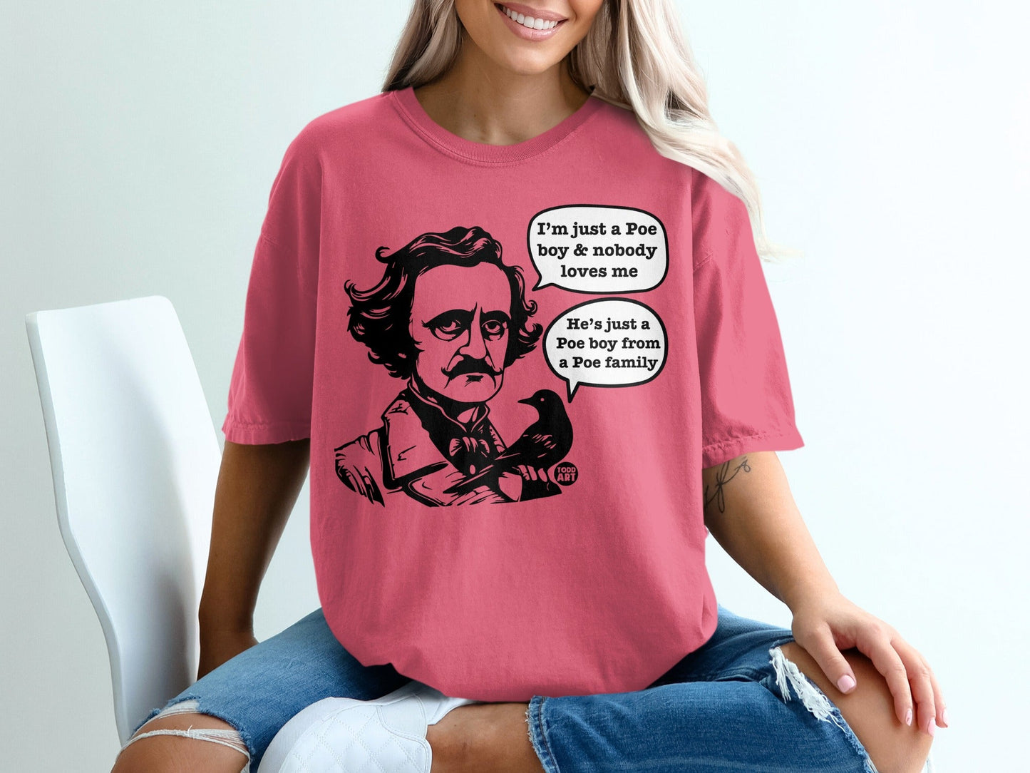 T-shirt with Edgar Allan Poe cartoon, a bird, and speech bubbles.