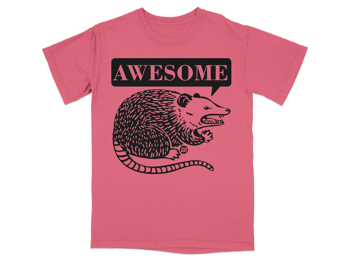 Pink t-shirt with a black illustration of an opossum in a speech bubble saying "AWESOME".