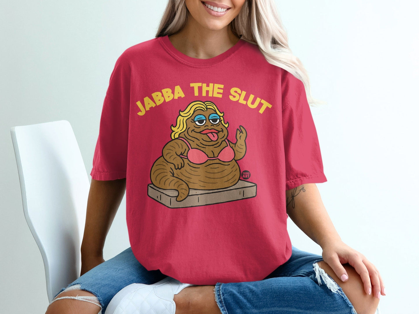 Red t-shirt with cartoon Jabba the Hutt in a bikini, text "JABBA THE SLUT".