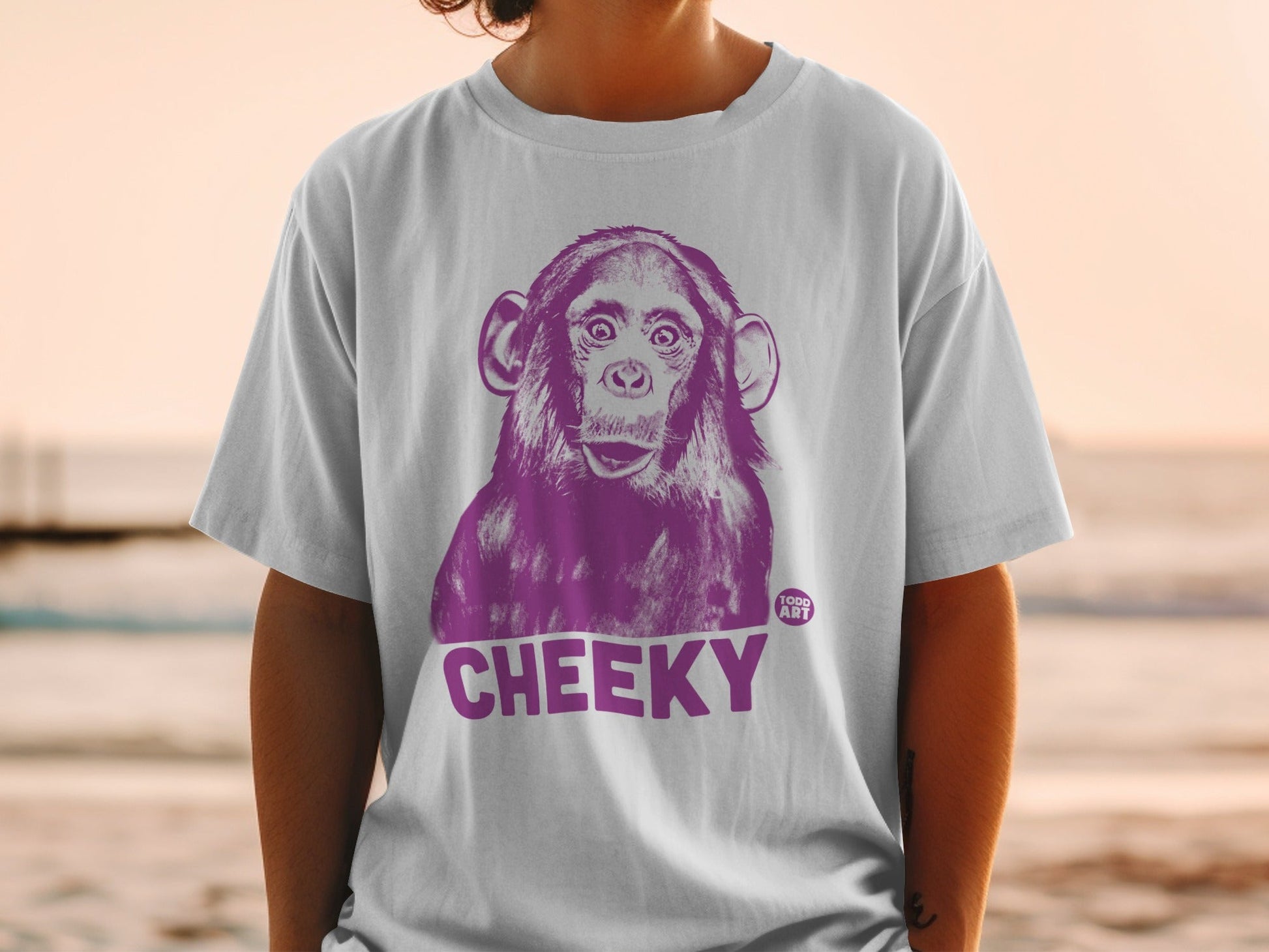 T-shirt with purple monkey graphic and "CHEEKY" text.