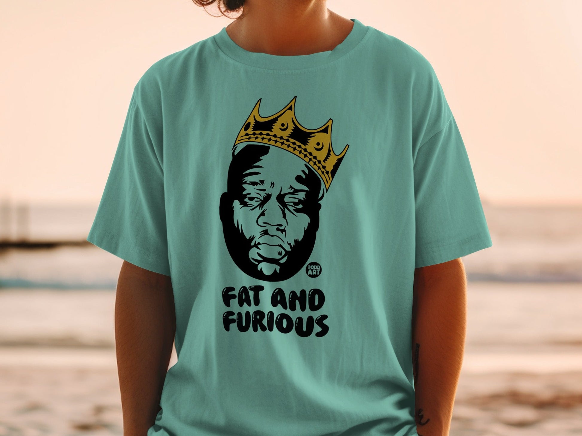 T-shirt featuring a portrait of Biggie Smalls wearing a crown, text "FAT AND FURIOUS".