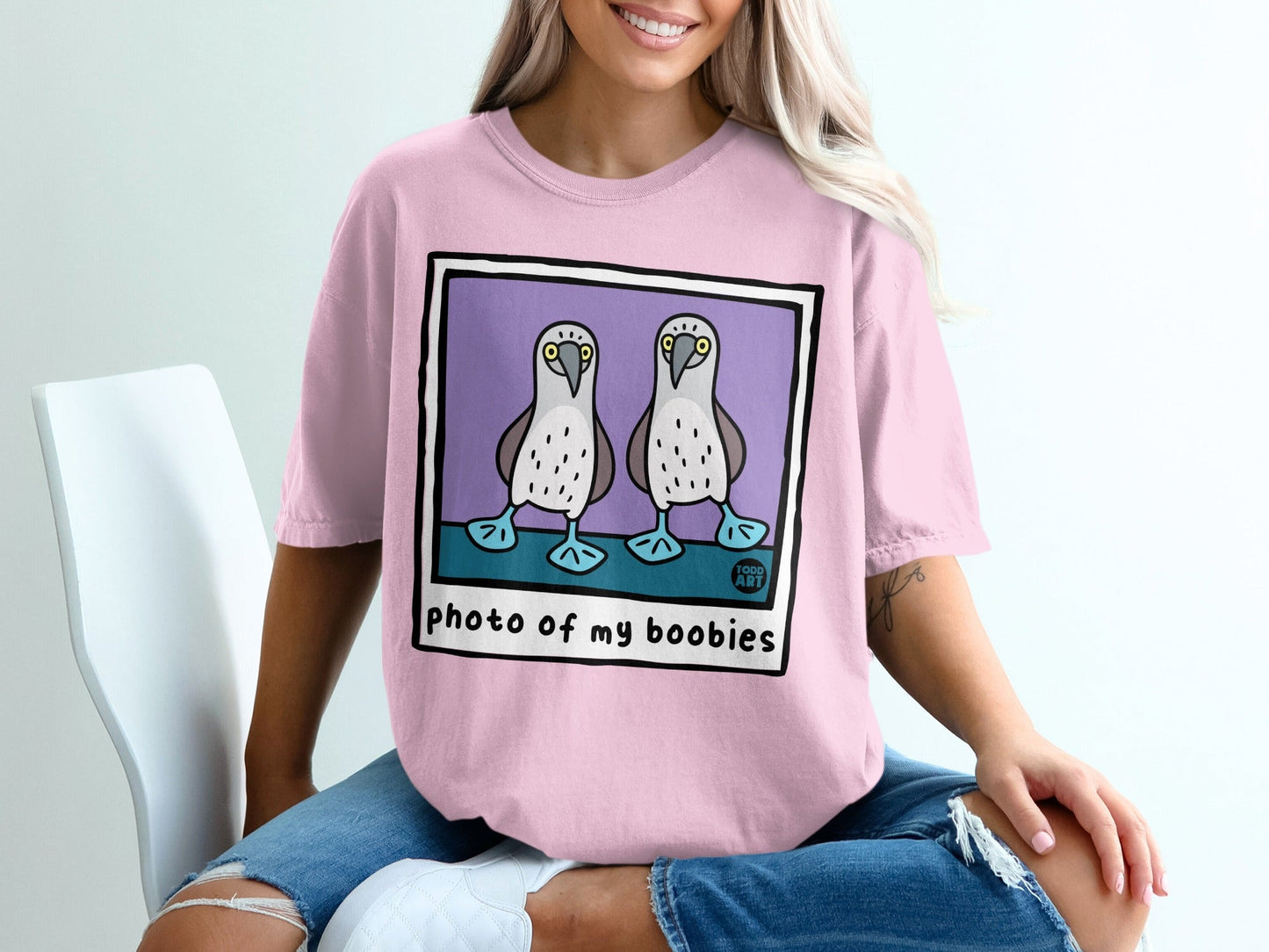Pink t-shirt with "photo of my boobies" text and two blue-footed boobies.
