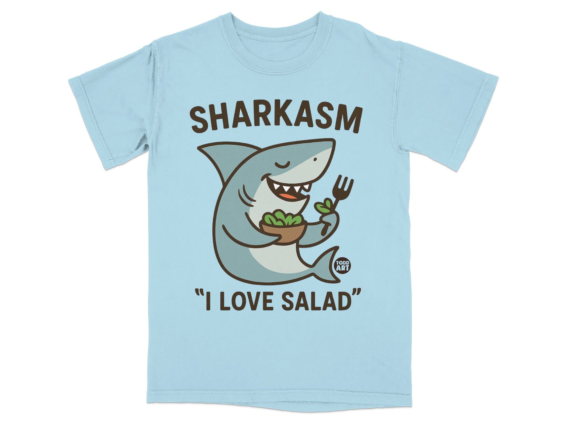 Light blue t-shirt with a cartoon shark holding a fork and a salad, saying "I LOVE SALAD".