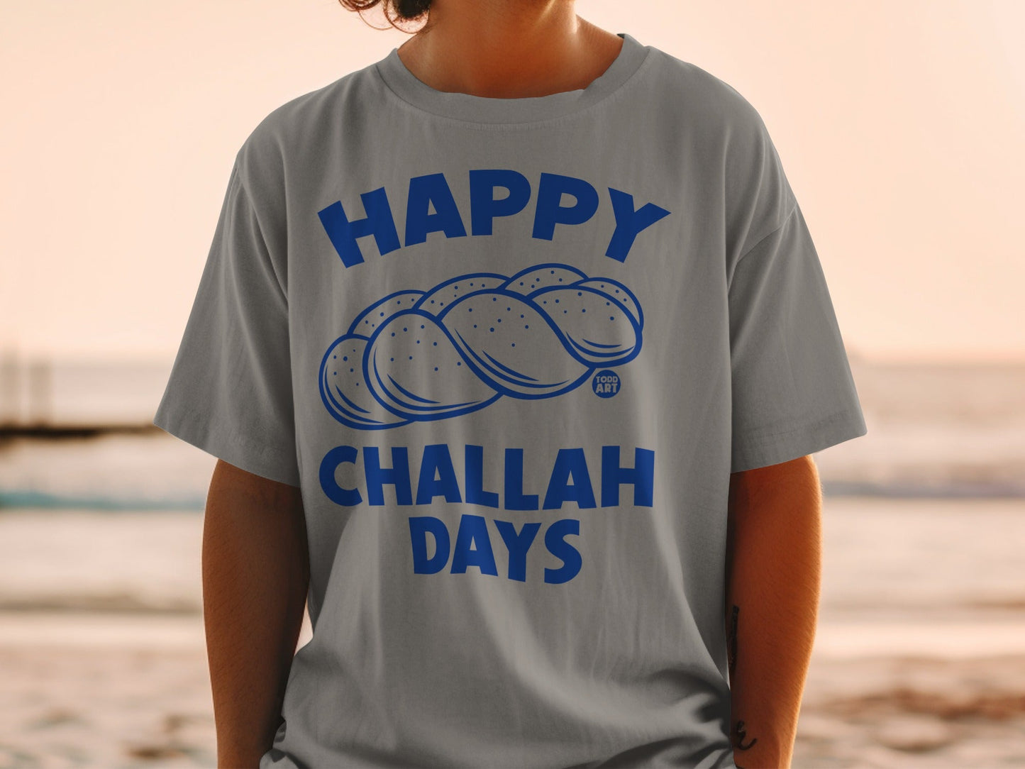 Gray t-shirt with braided challah bread graphic and "Happy Challah Days" text.