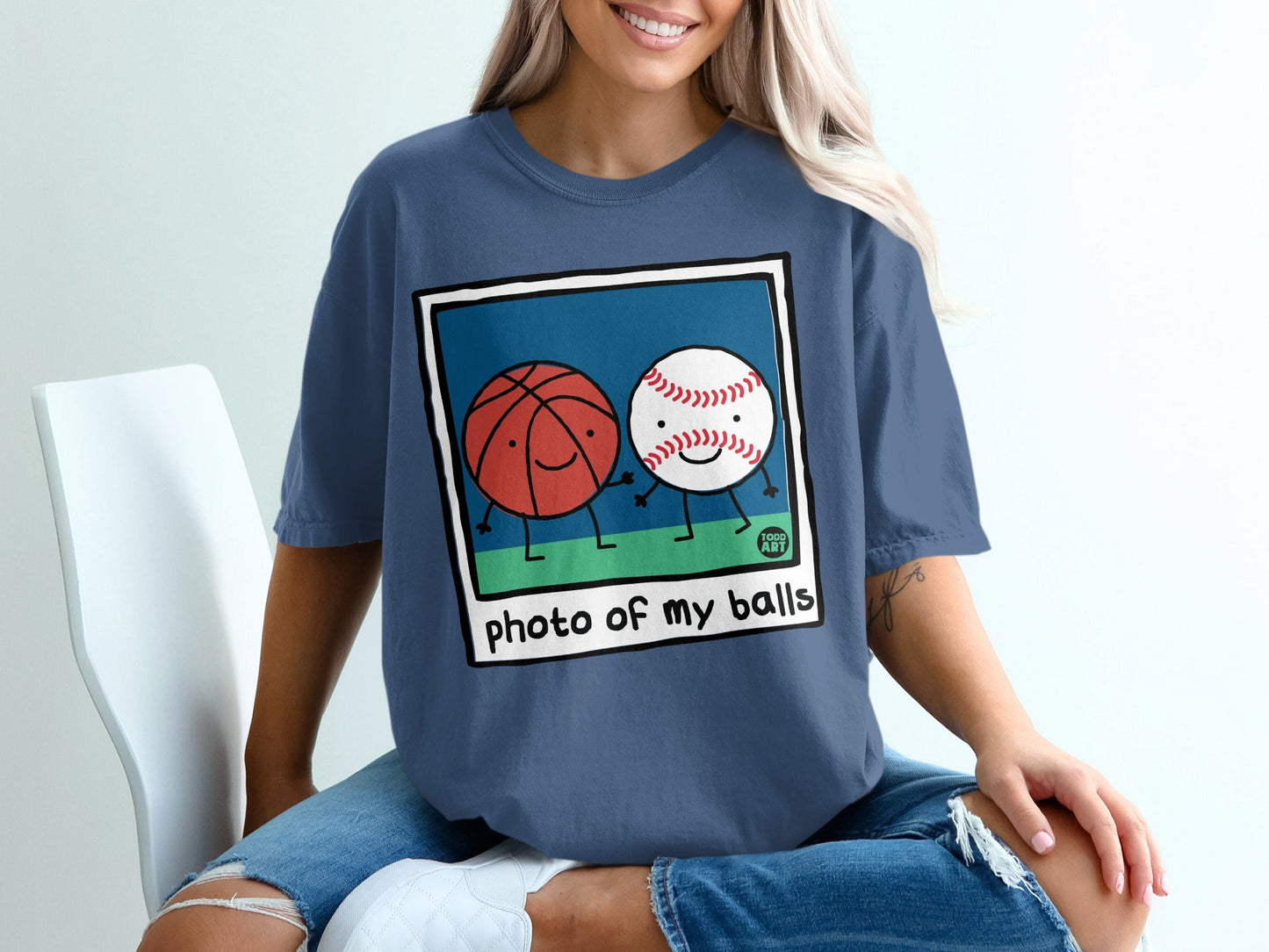 Basketball and baseball characters holding hands, "photo of my balls" text.