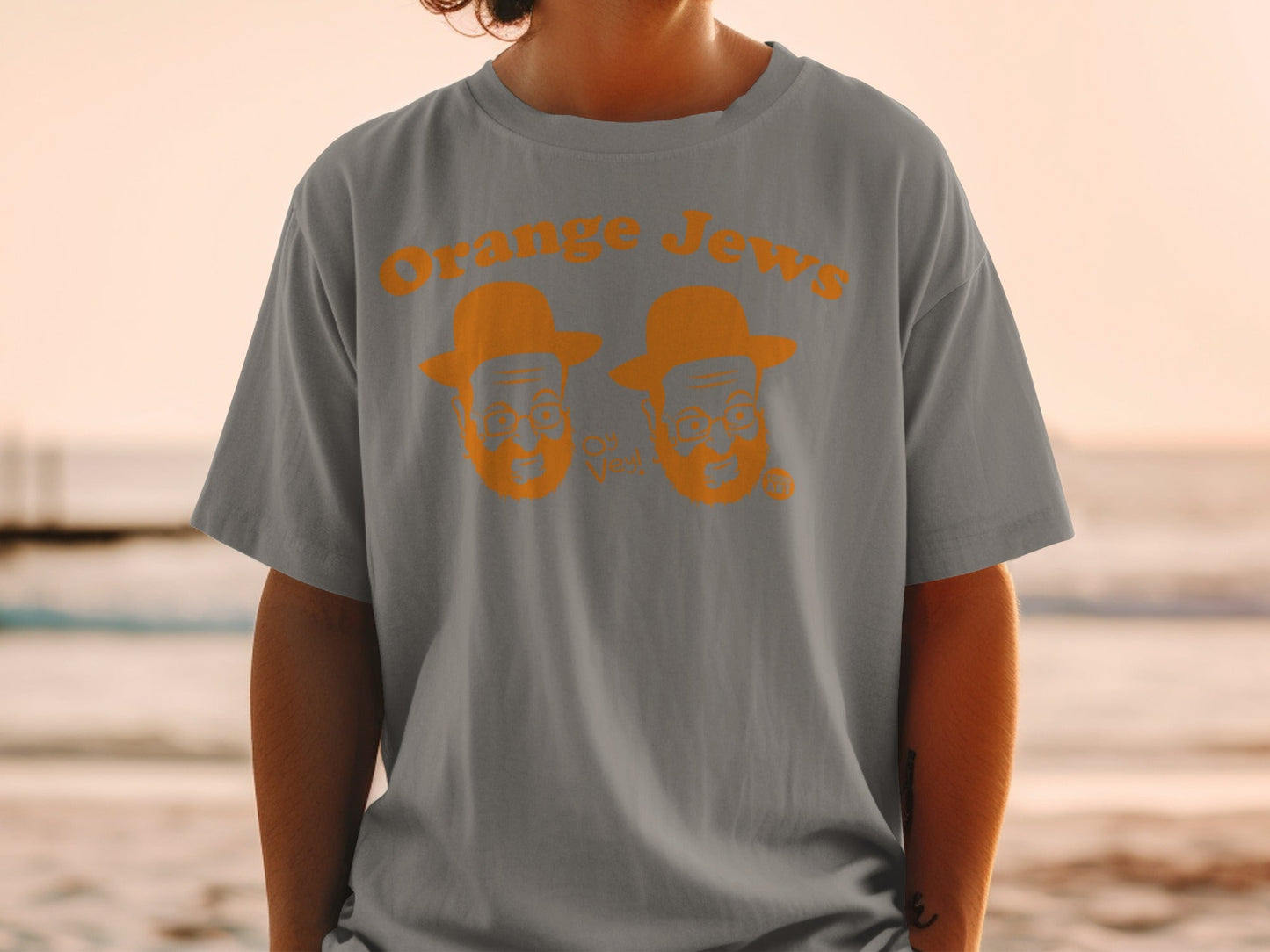 Gray t-shirt with orange "Orange Jews" text and cartoon faces.