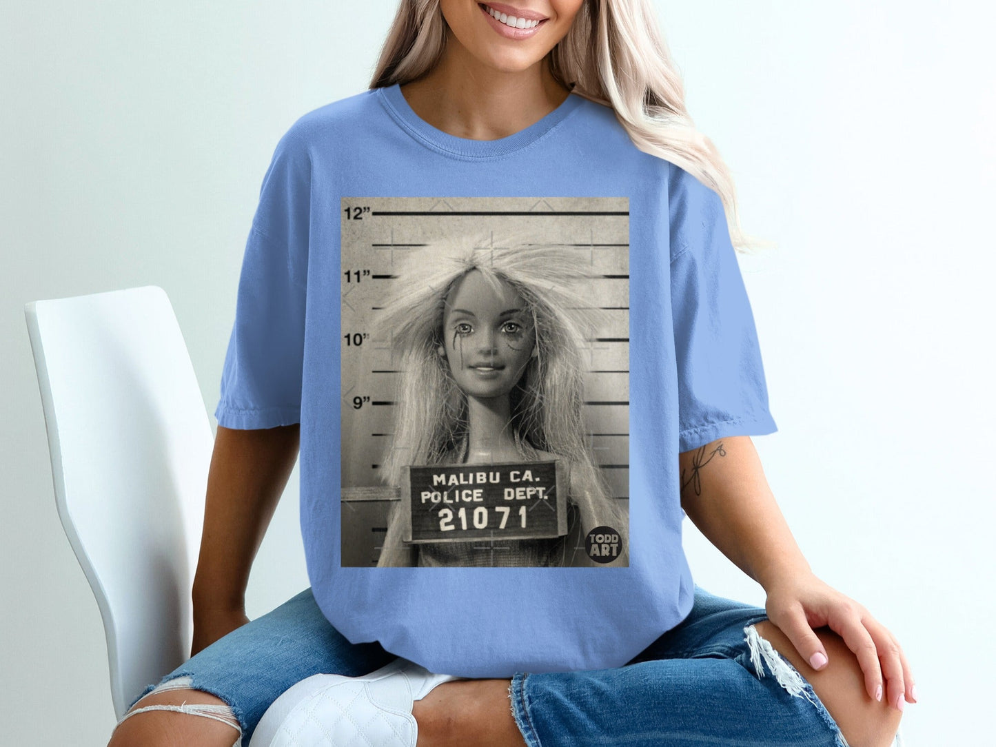 Barbie mugshot with "MALIBU CA. POLICE DEPT. 21071" text.