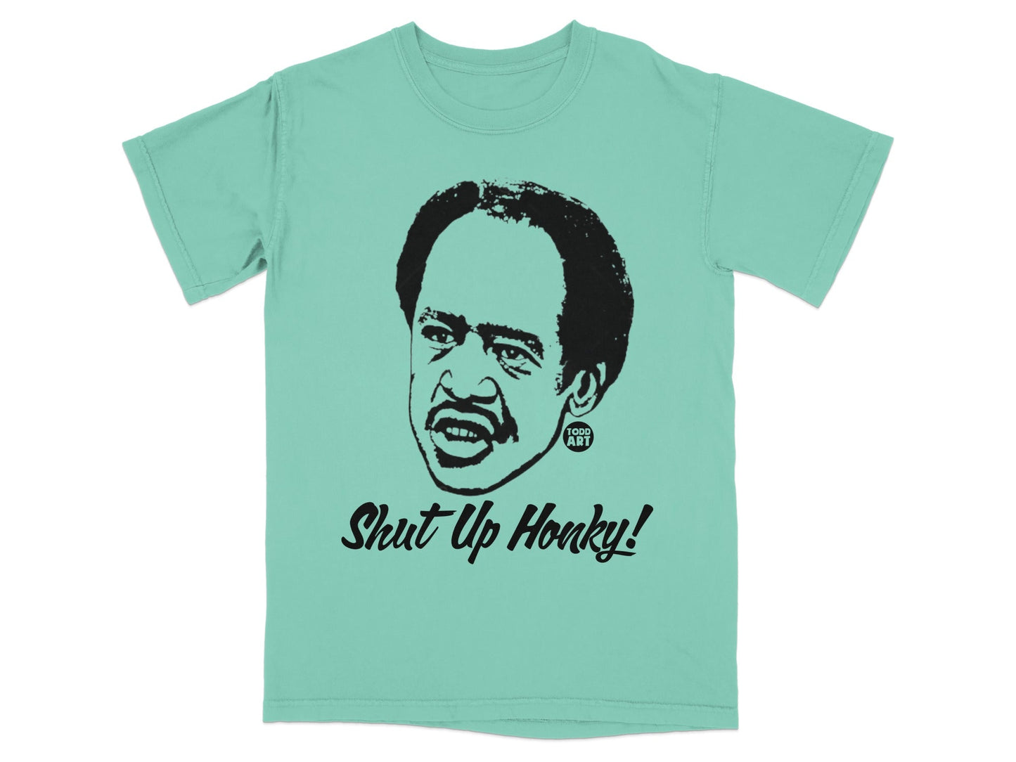 Teal t-shirt with a black graphic of Richard Pryor saying "Shut Up Honky!"