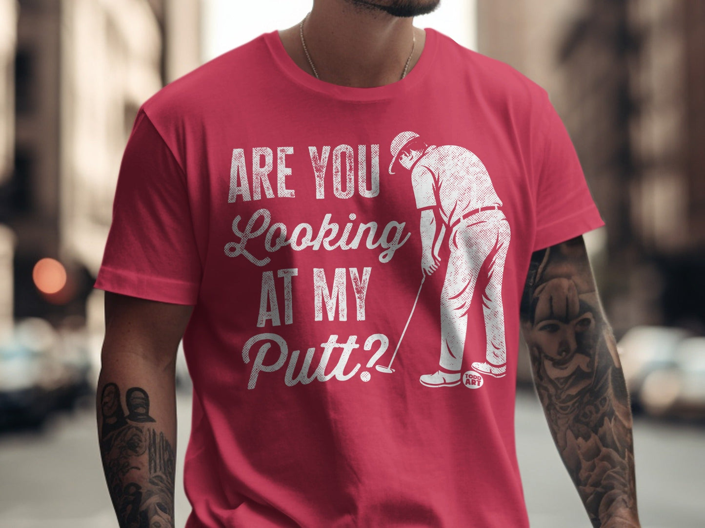 T-shirt with text "ARE YOU Looking AT MY Putt?" and a golfer graphic.
