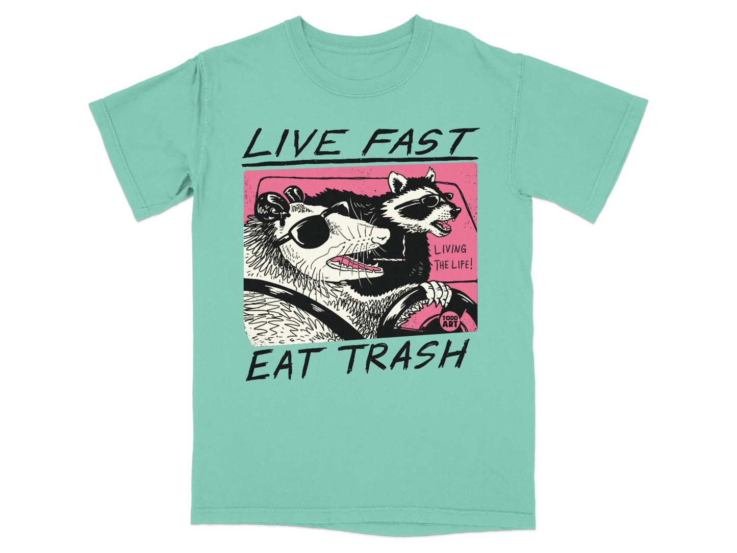Opossum and raccoon wearing sunglasses driving a car, text "LIVE FAST EAT TRASH".