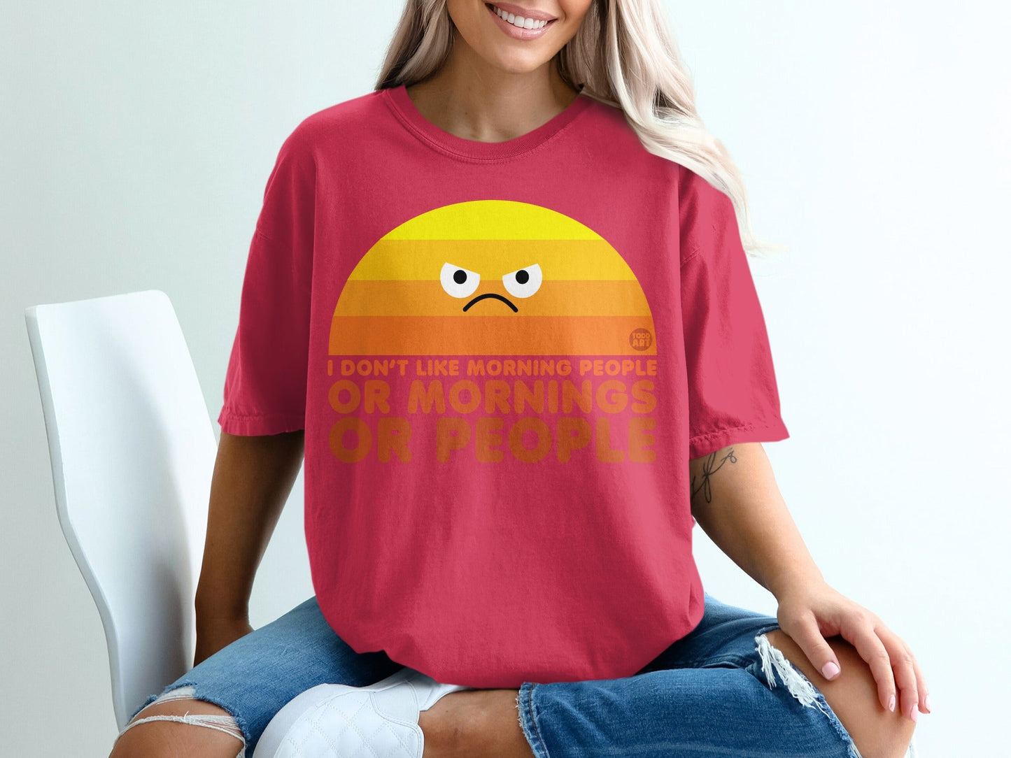 Crimson t-shirt with angry sun graphic and text: "I don't like morning people or people."