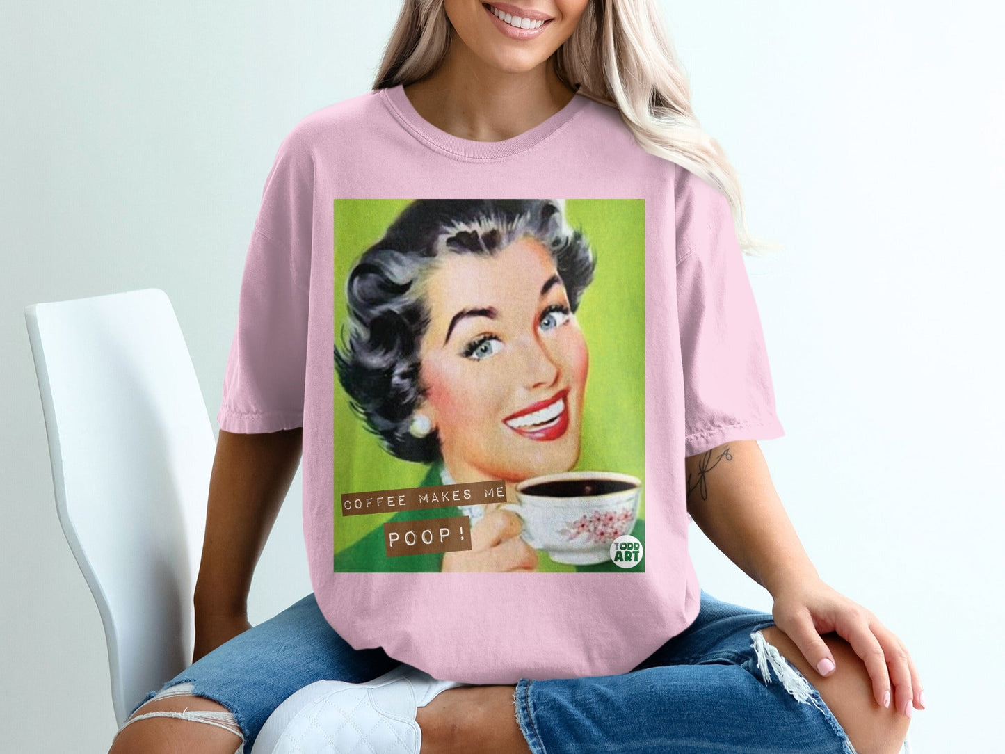 Woman in pink shirt holding coffee cup with "Coffee Makes Me Poop!" text.