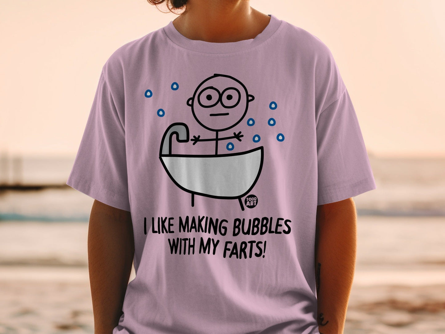 T-shirt with cartoon of person in bathtub making bubbles with text "I LIKE MAKING BUBBLES WITH MY FARTS!".