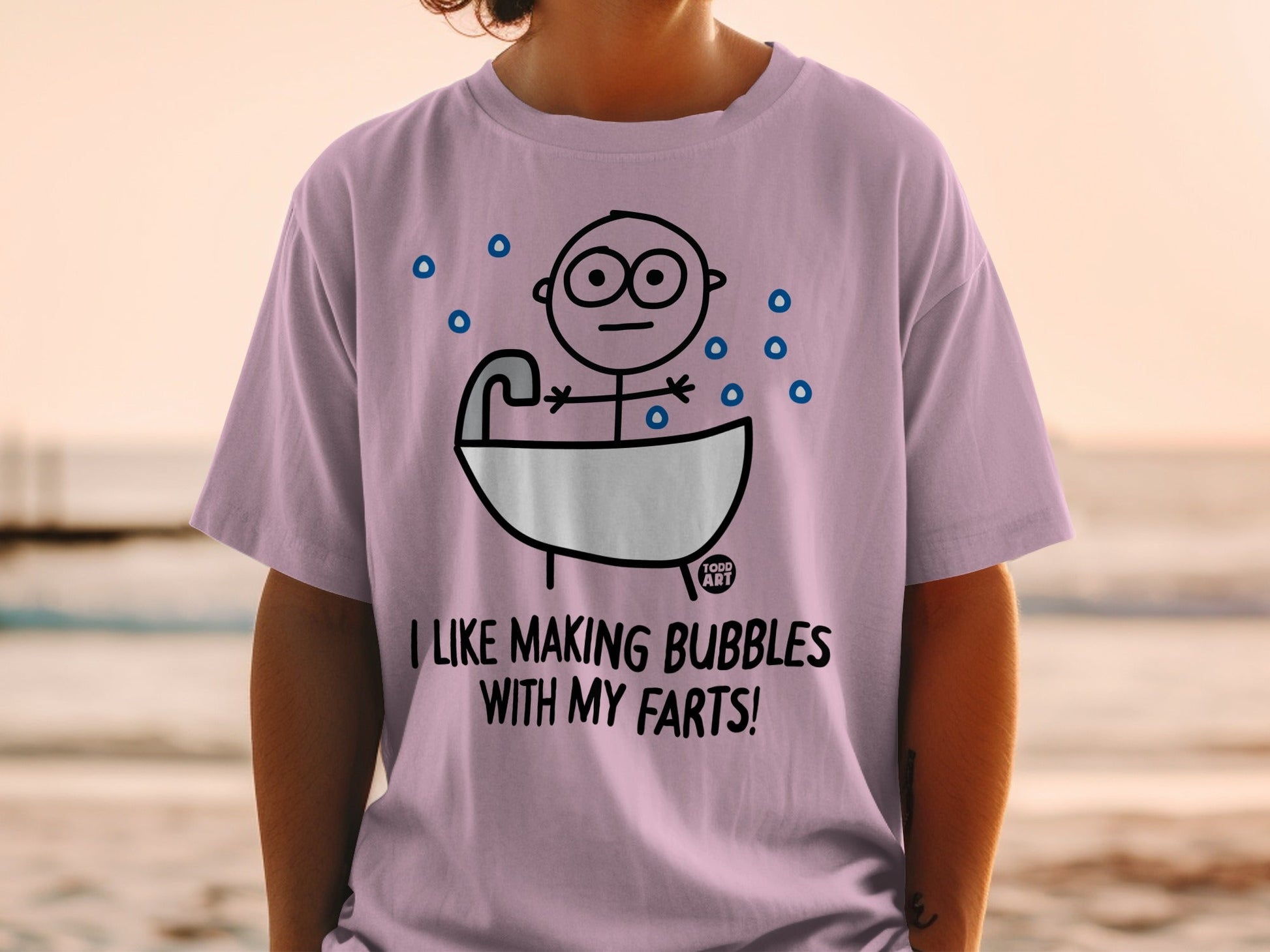 T-shirt with cartoon of person in bathtub making bubbles with text "I LIKE MAKING BUBBLES WITH MY FARTS!".