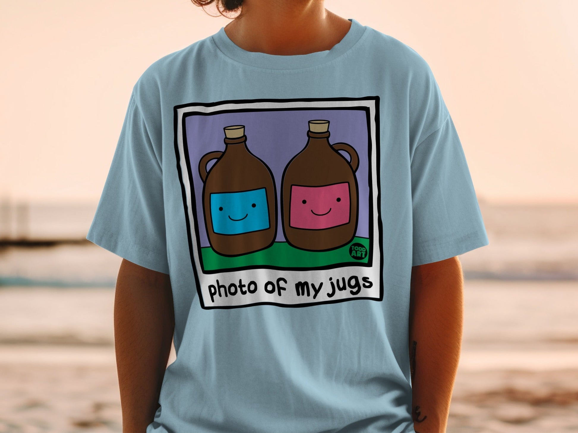 Light blue t-shirt with cartoon jugs labeled "photo of my jugs".