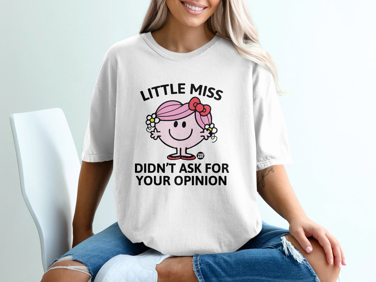 White t-shirt with "LITTLE MISS DIDN'T ASK FOR YOUR OPINION" text and illustration.