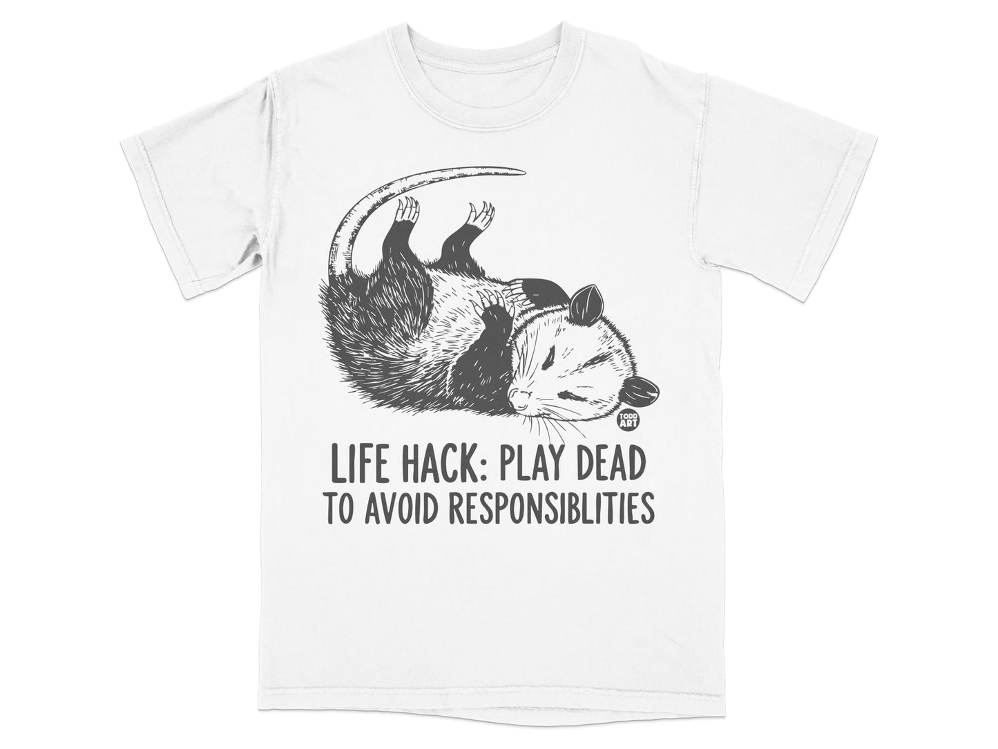 T-shirt graphic of opossum playing dead with text "LIFE HACK: PLAY DEAD TO AVOID RESPONSIBILITIES".