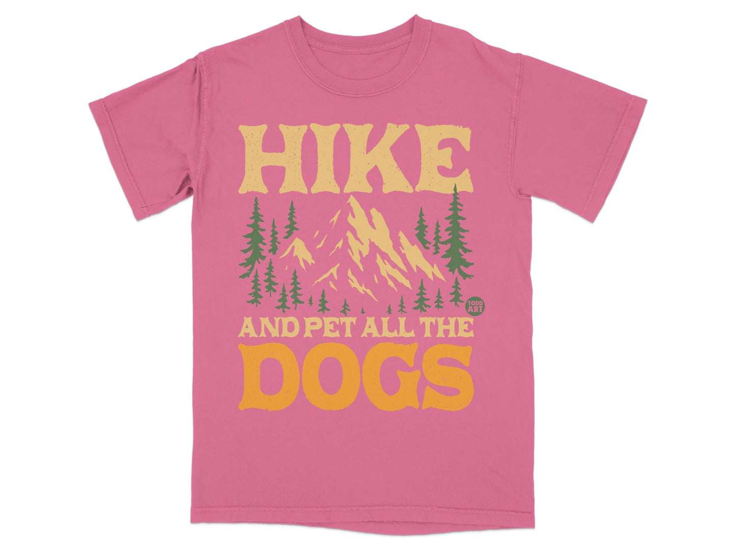 Pink t-shirt with "Hike and Pet All the Dogs" and mountain graphic.