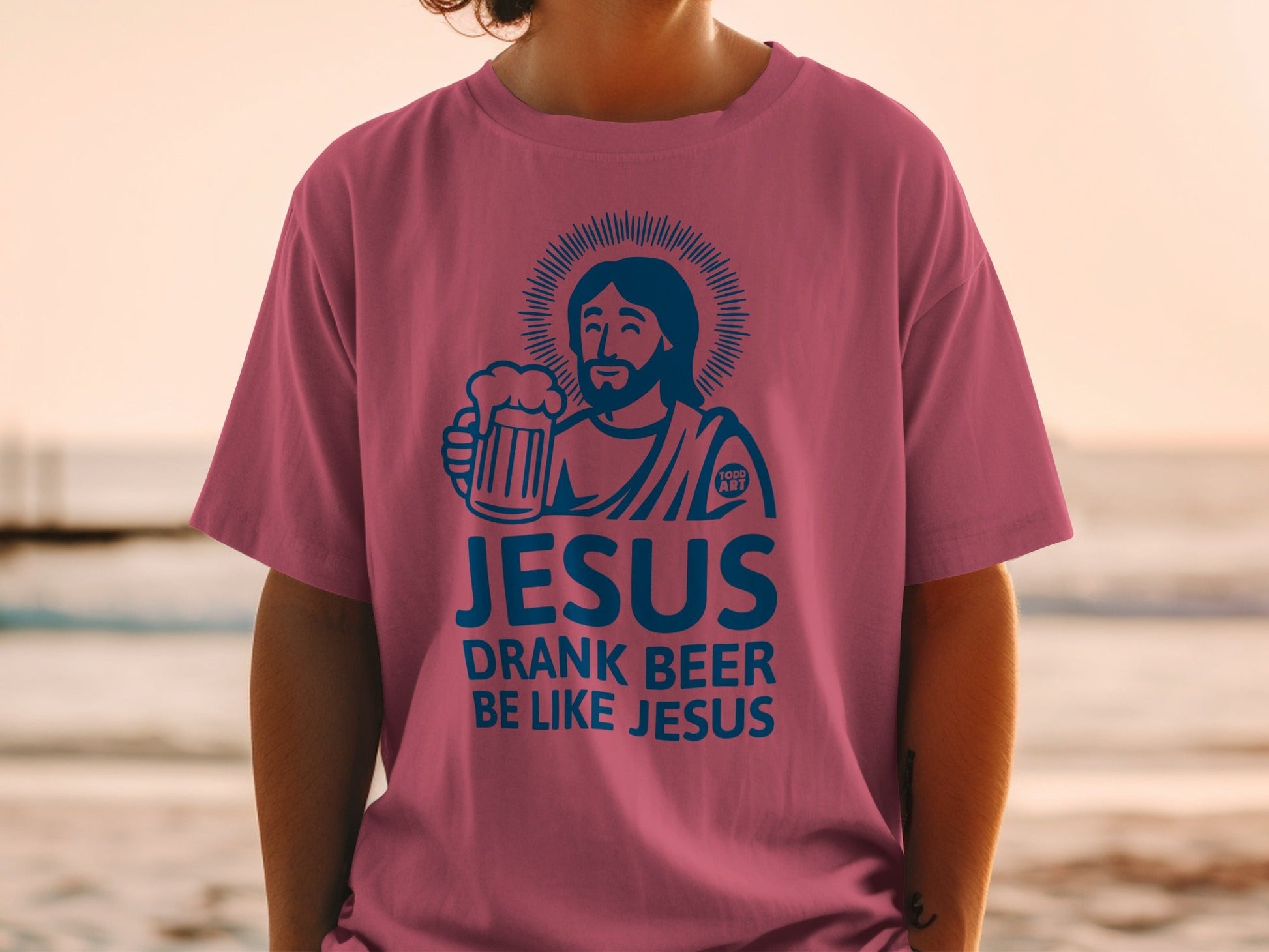 T-shirt with Jesus holding a beer and text "DRANK BEER BE LIKE JESUS".