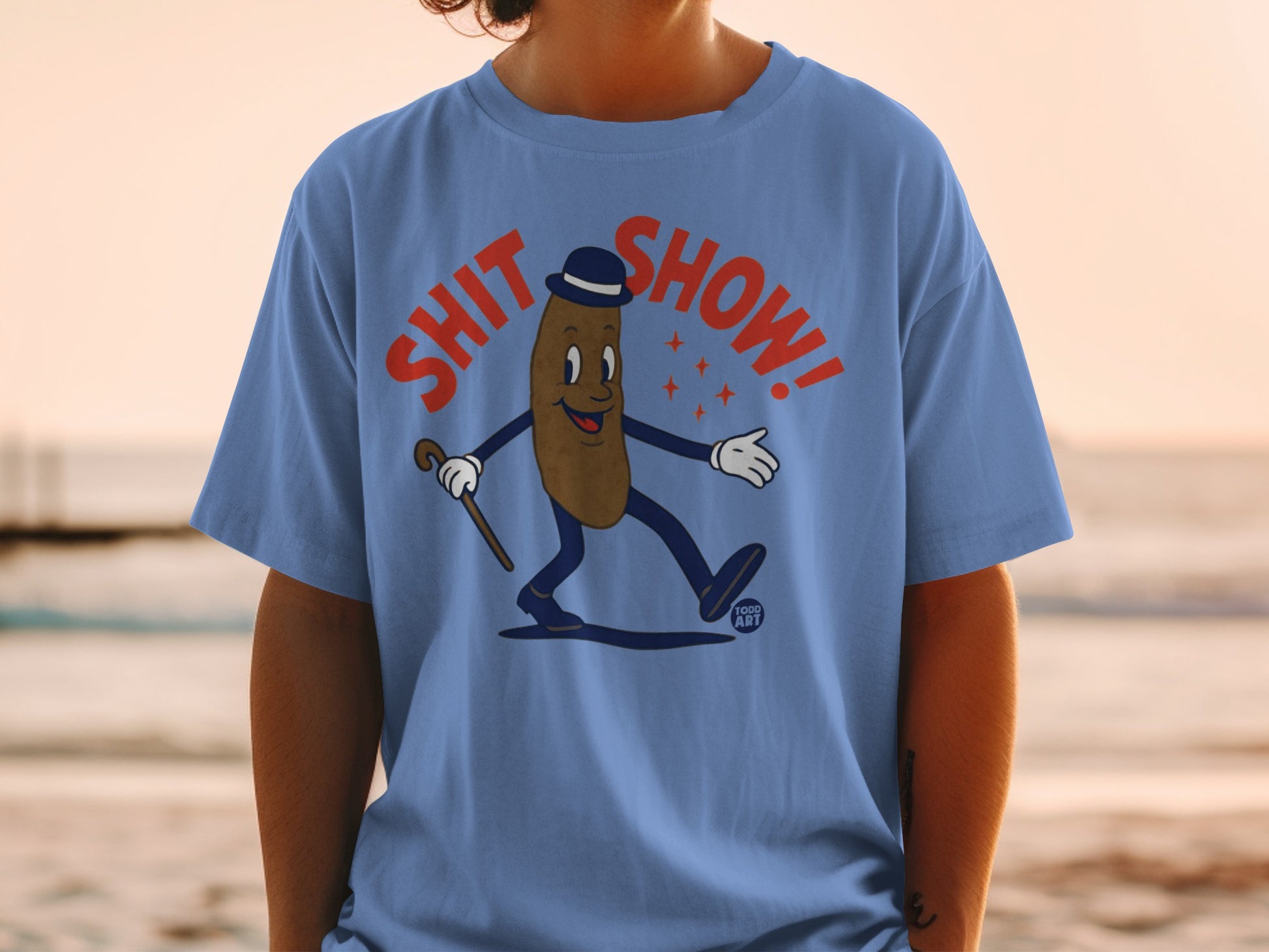 Cartoon poop character in bowler hat and cane, wearing a blue t-shirt.