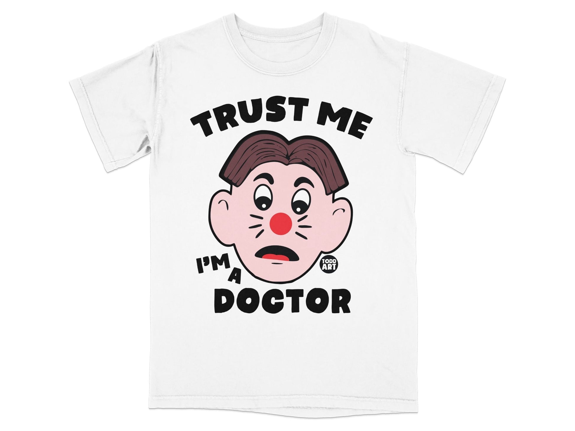 White t-shirt with cartoon face and text "TRUST ME I'M A DOCTOR".