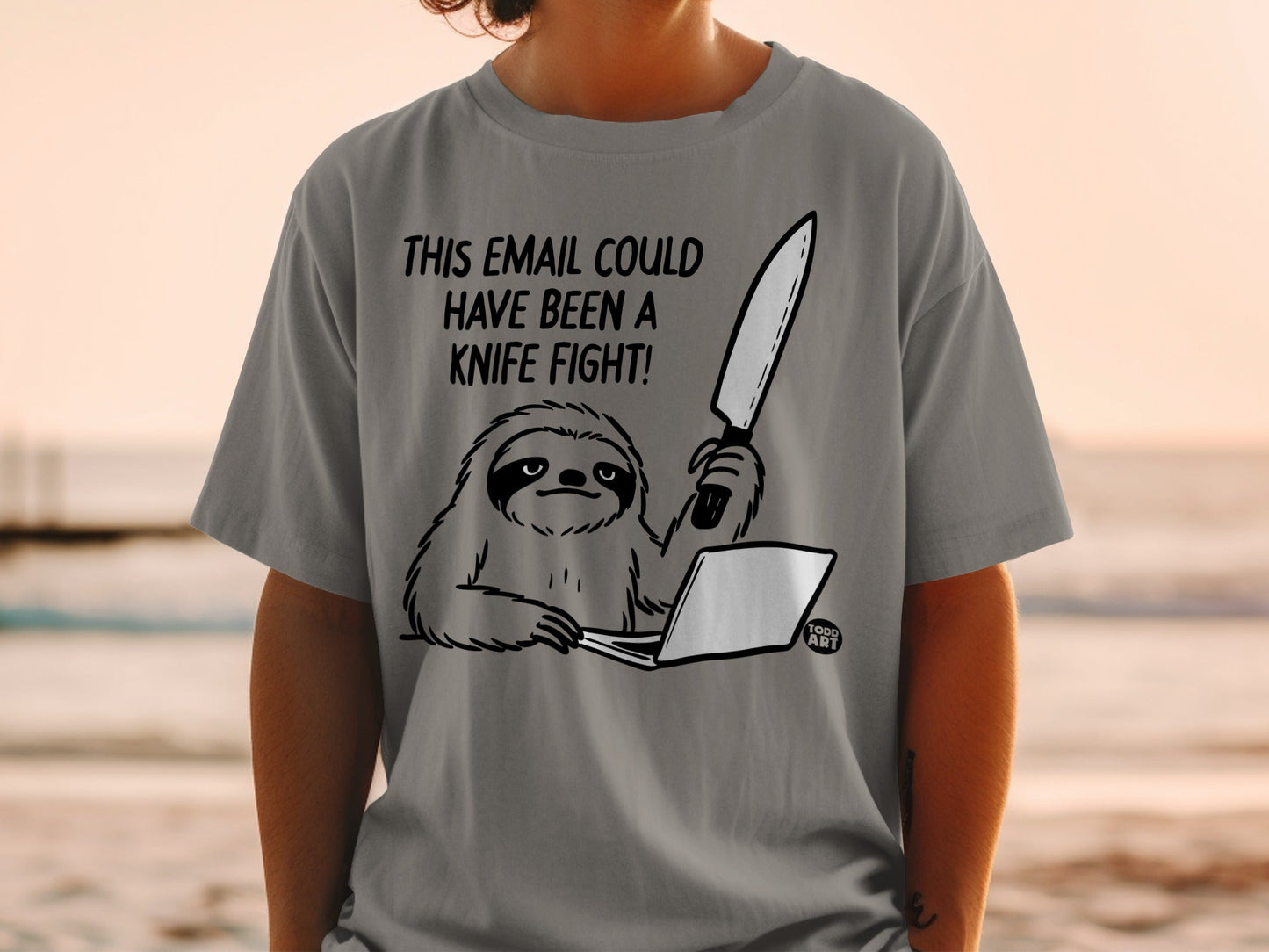 T-shirt with a sloth holding a knife to a laptop, text reads "This email could have been a knife fight."