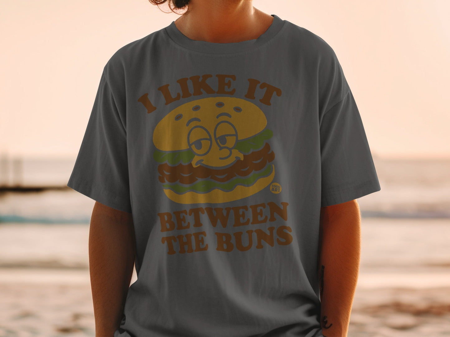 I Like It Between The Buns Graphic Tee Shirt