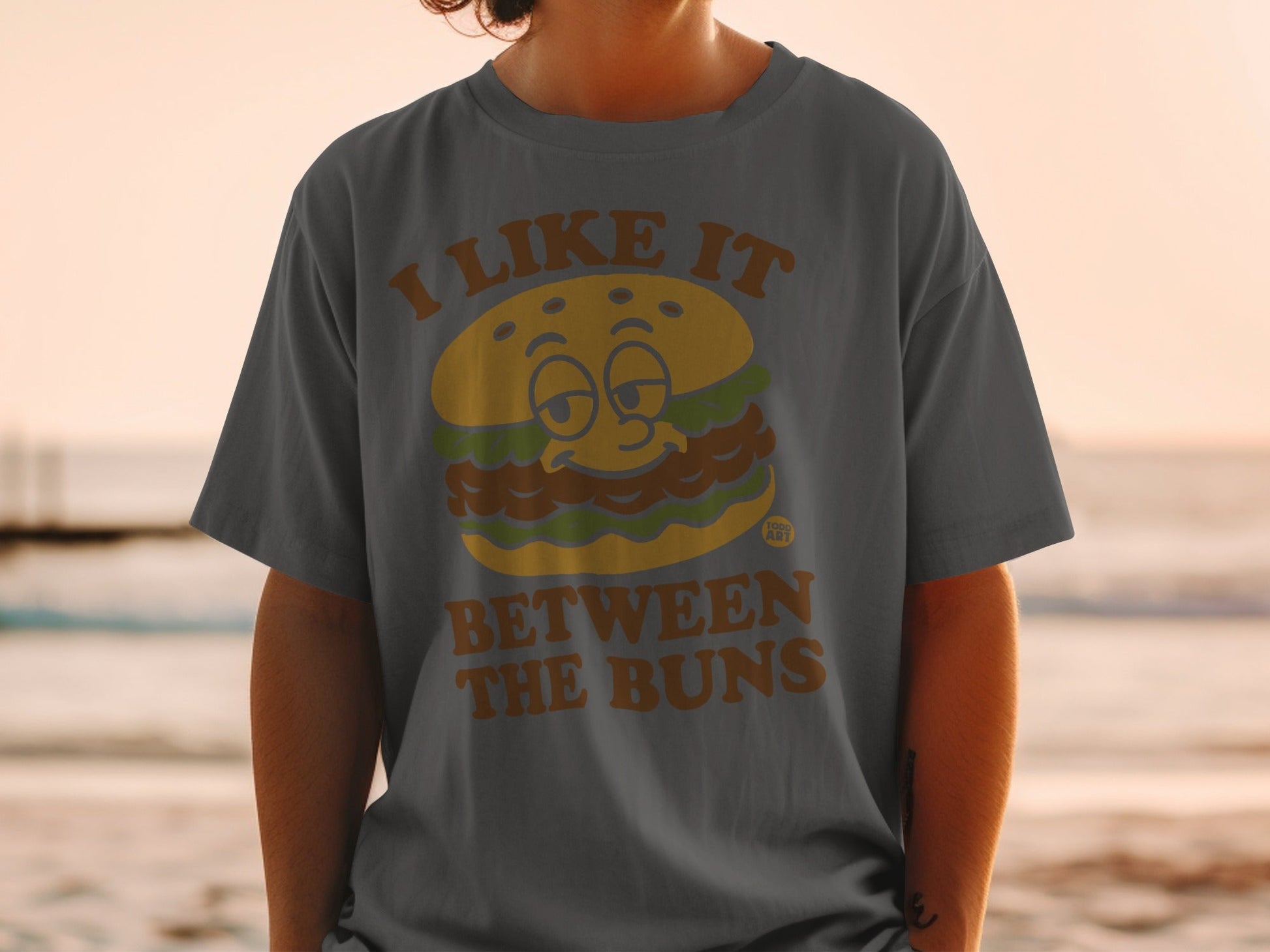 I Like It Between The Buns Graphic Tee Shirt